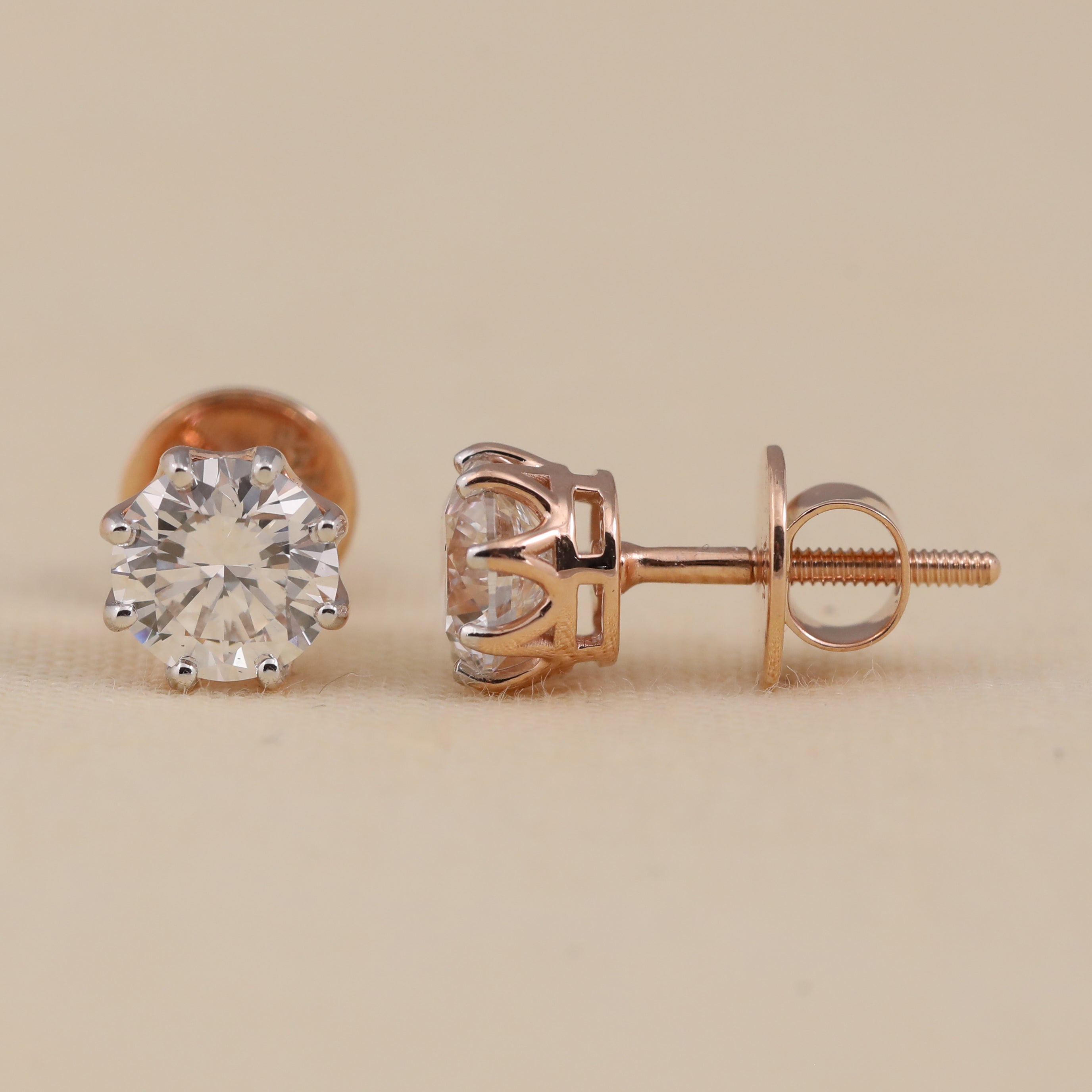 Timeless round diamond stud earrings great for birthday or festive celebrations