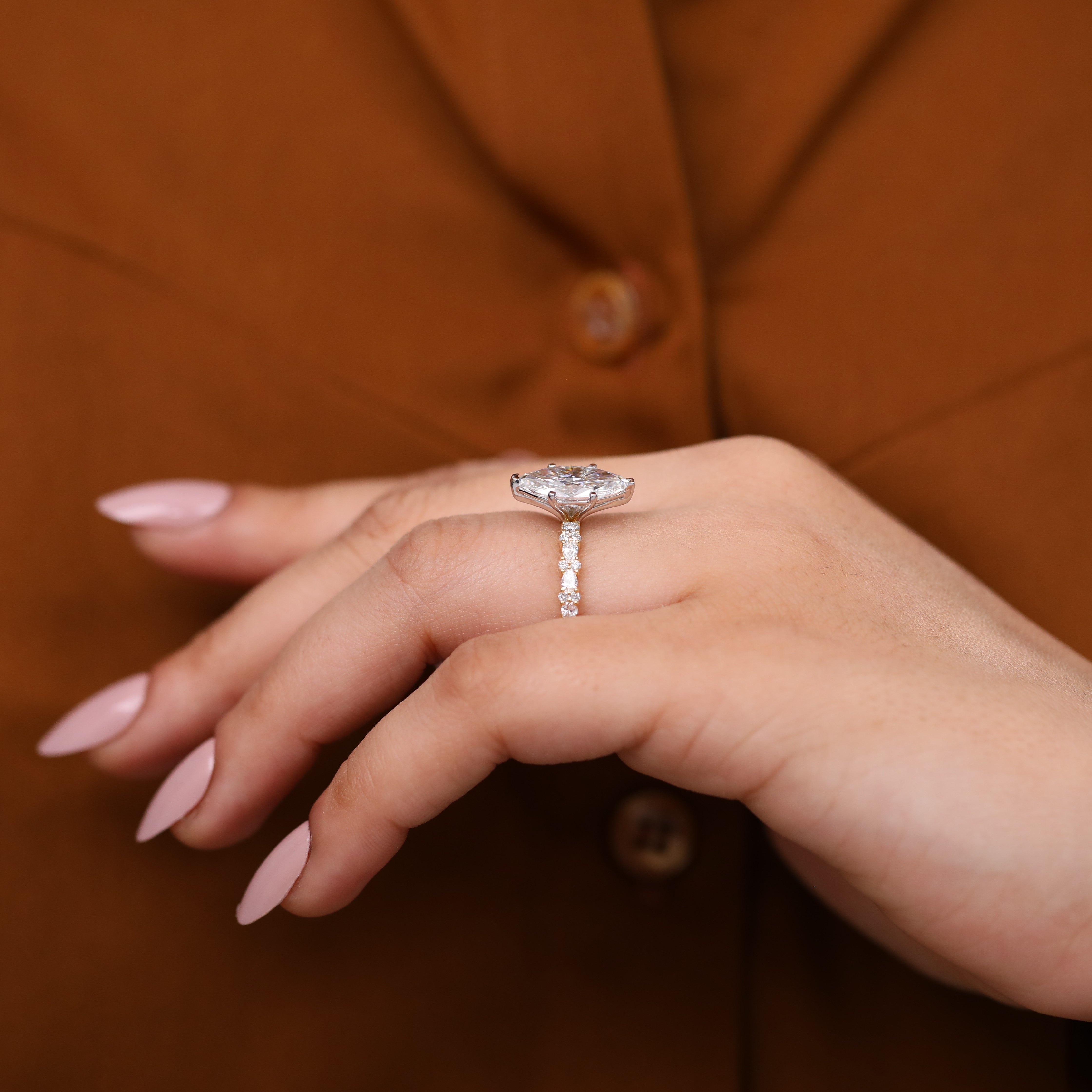 Marquise-shaped lab-grown diamond engagement ring with a bright, tapered band