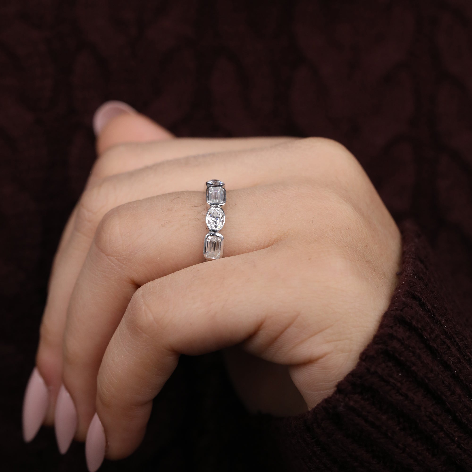 Multi shape lab diamond anniversary band with emerald, round, and oval cut stones