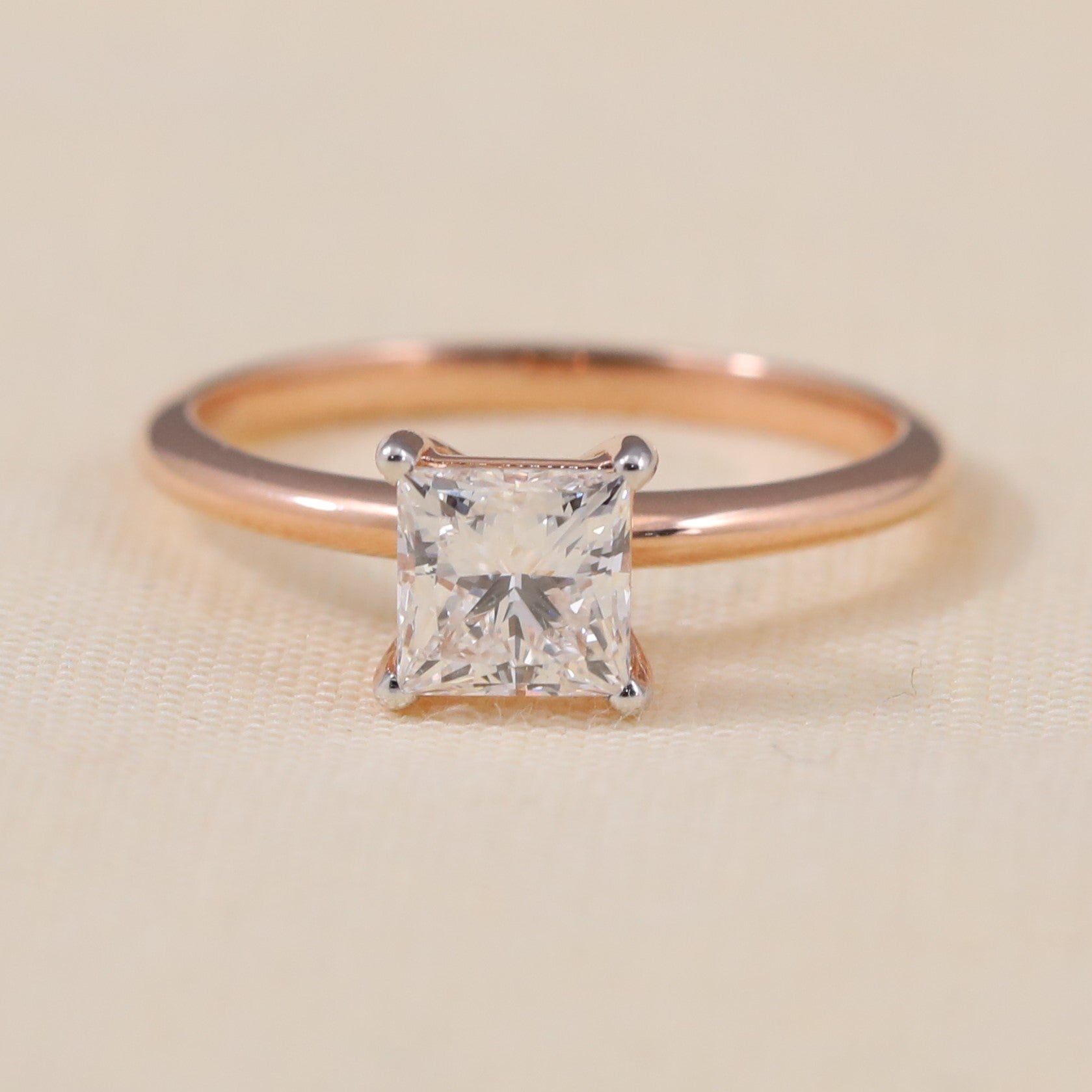 Princess cut lab grown diamond solitaire ring featuring a clean minimalist band