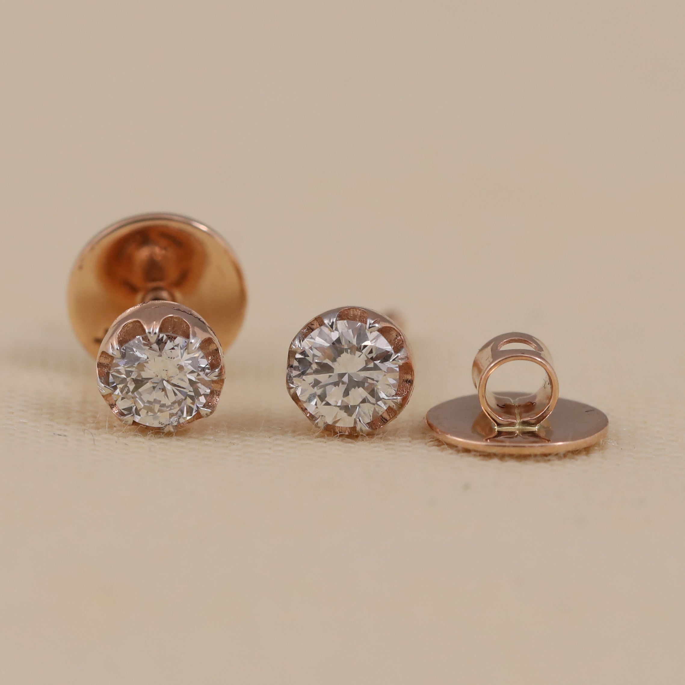 Sparkling round diamond earrings perfect for engagement or anniversary occasions.