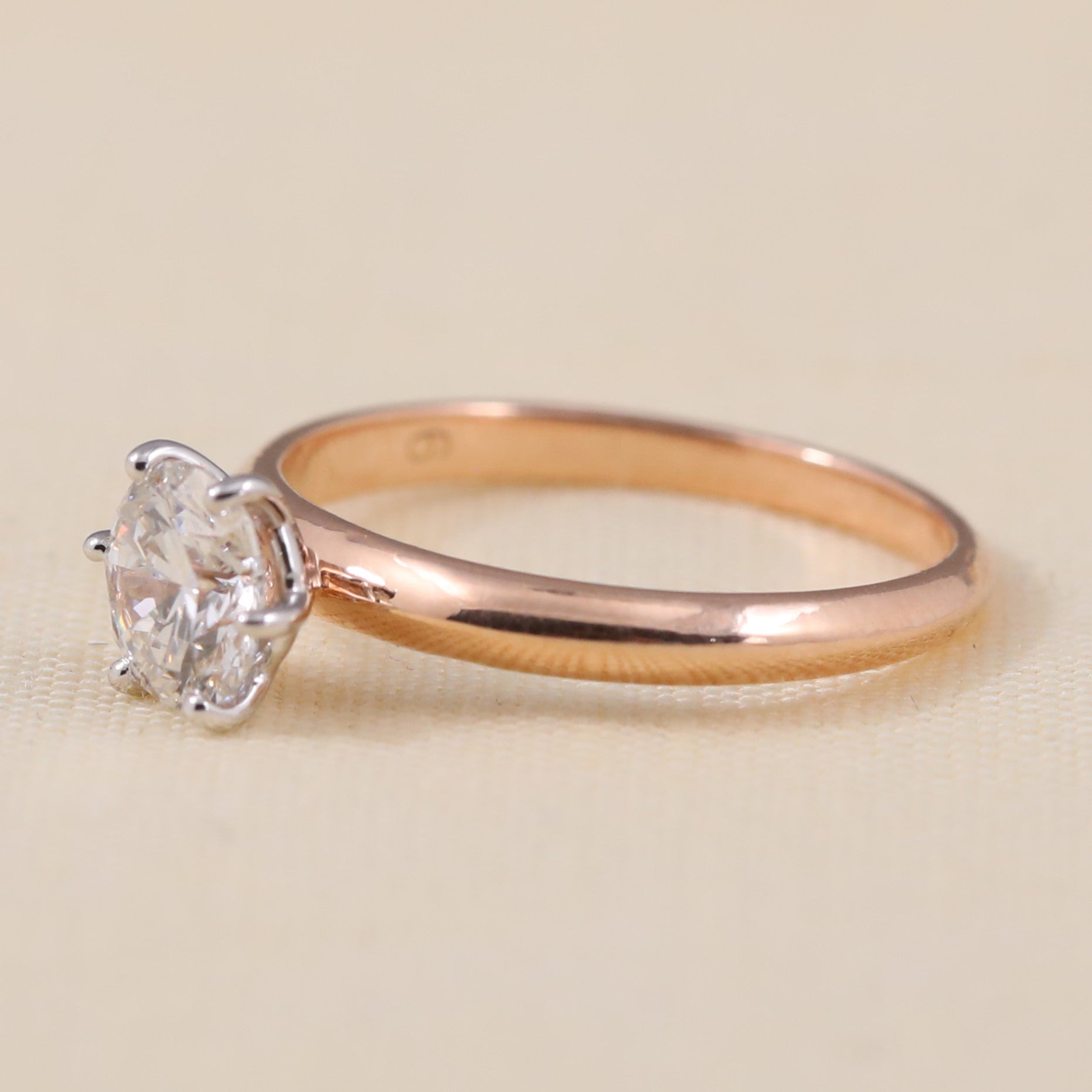 Elegant solitaire ring showcasing a brilliant round lab grown diamond centerpiece