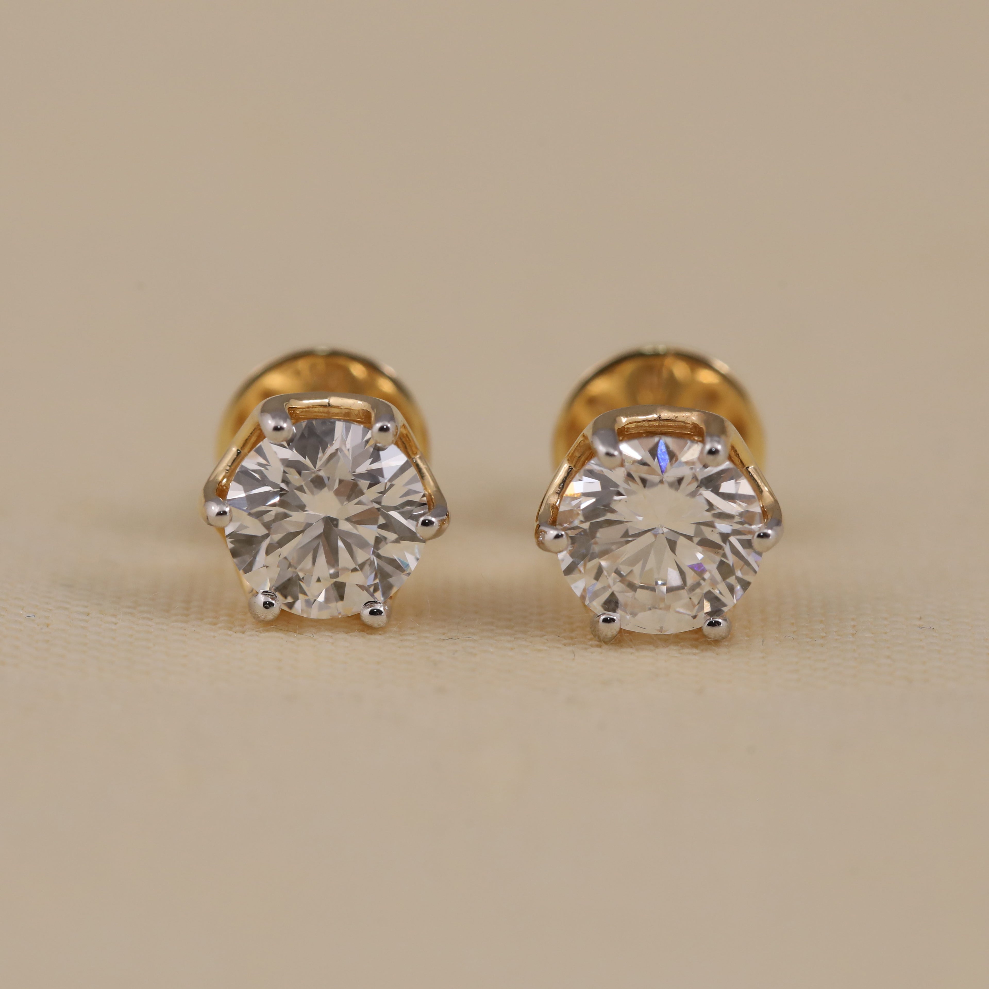 Round solitaire diamond stud earrings perfect for wedding and anniversary gifting.