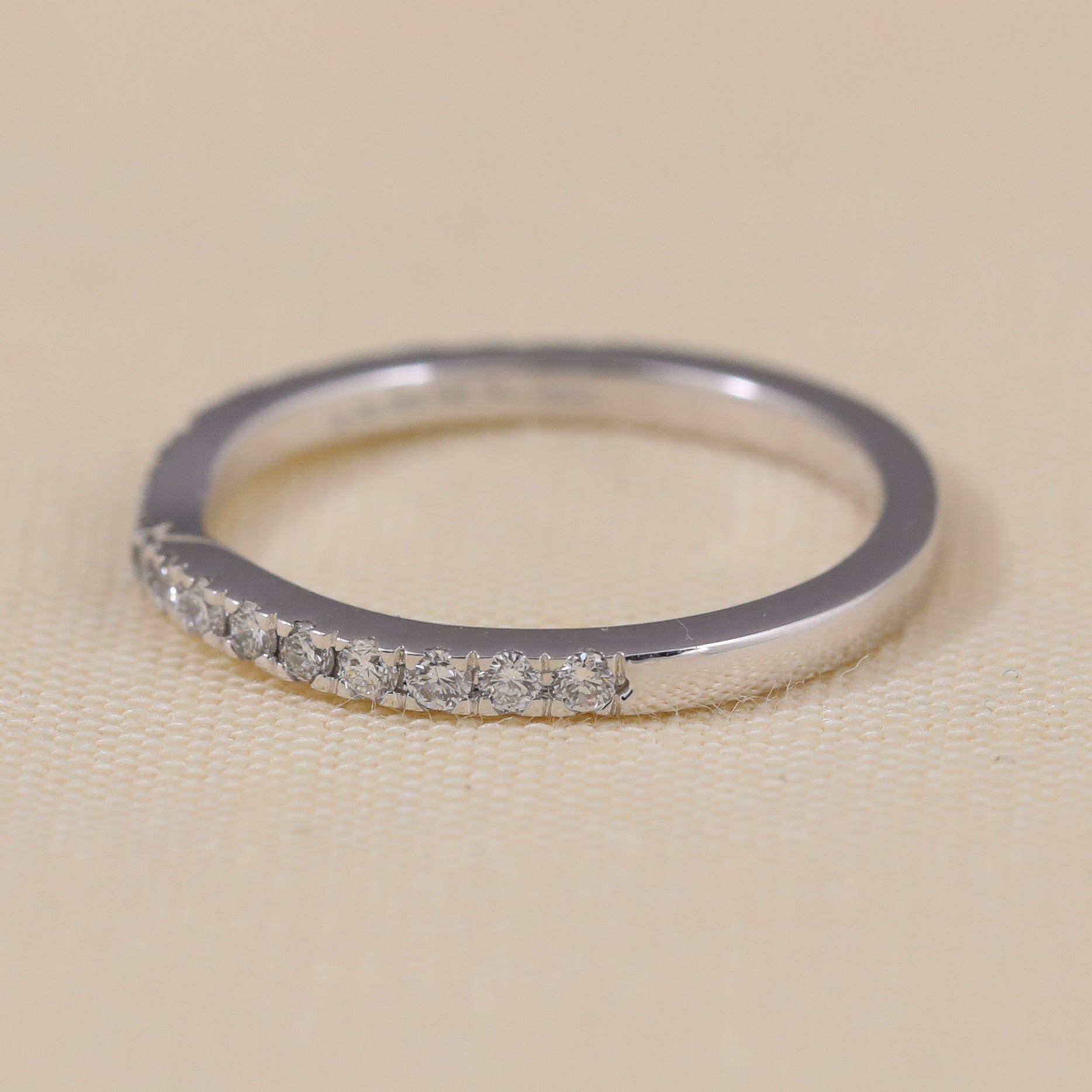 Elegant diamond pavé band ring perfect for stacking or bridal wear.