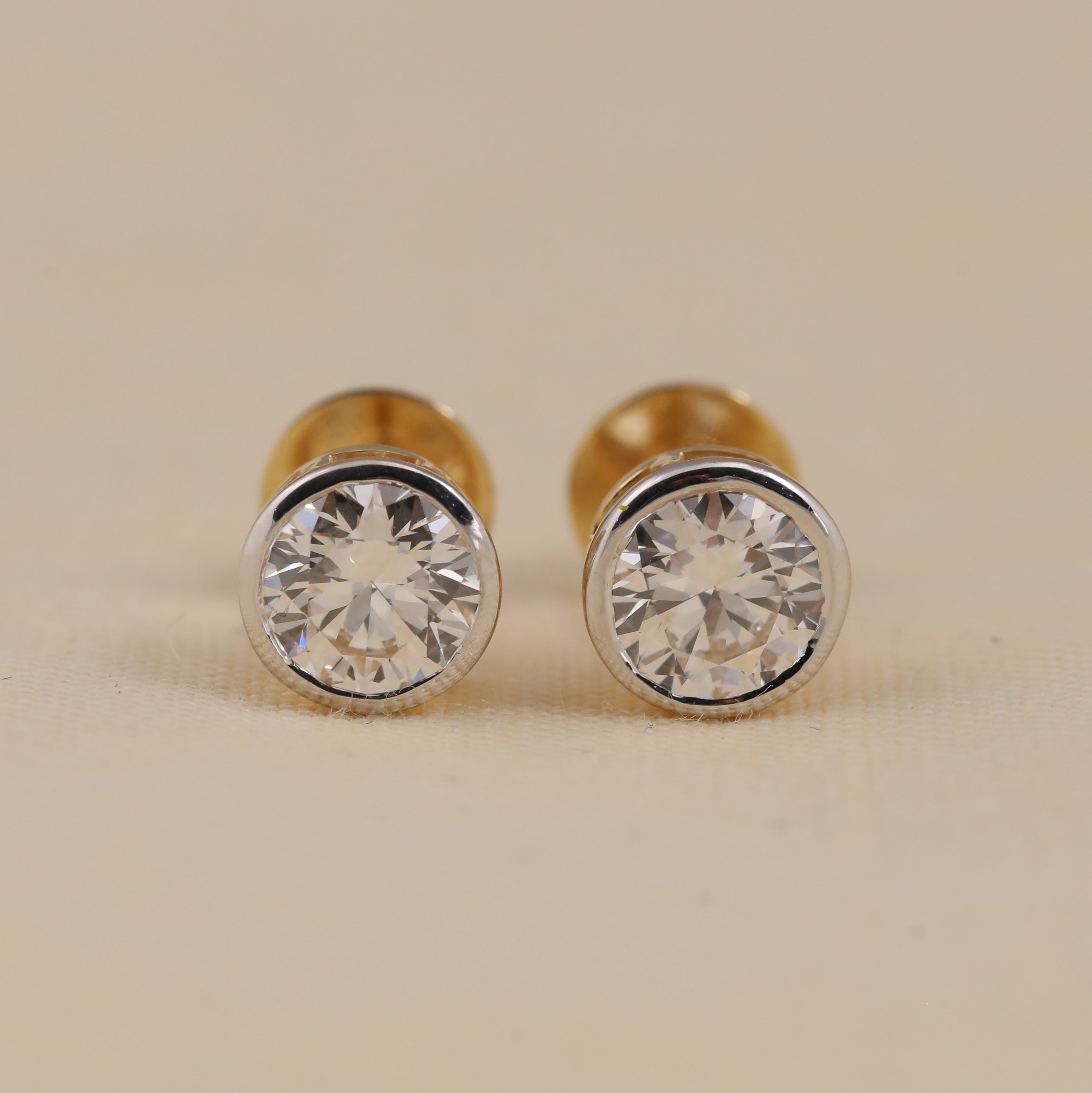 Round lab grown diamond bezel stud earrings for everyday wear gifting