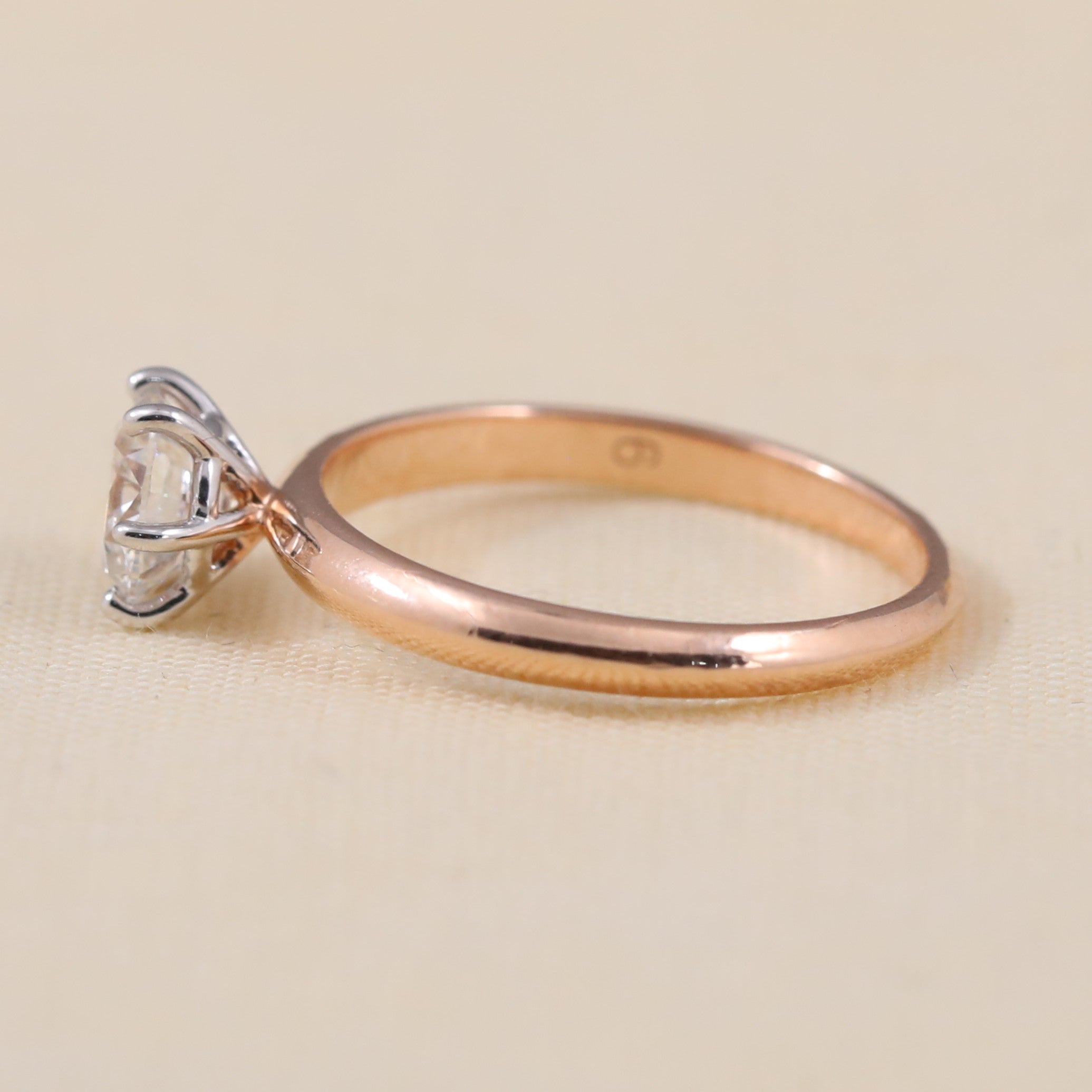 Timeless engagement ring crafted with a radiant round lab grown diamond