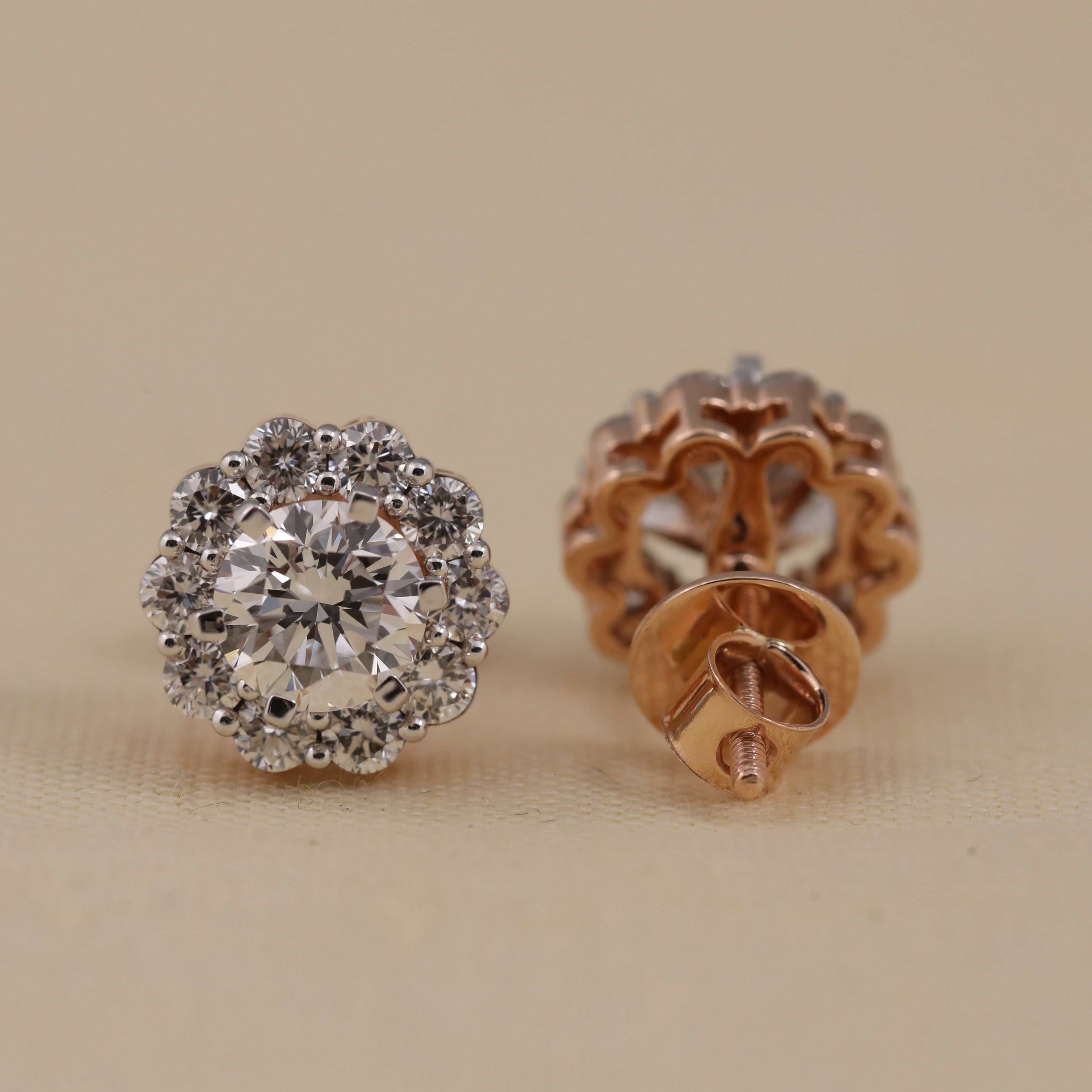 Elegant round floral halo diamond studs ideal for anniversary and celebrations.