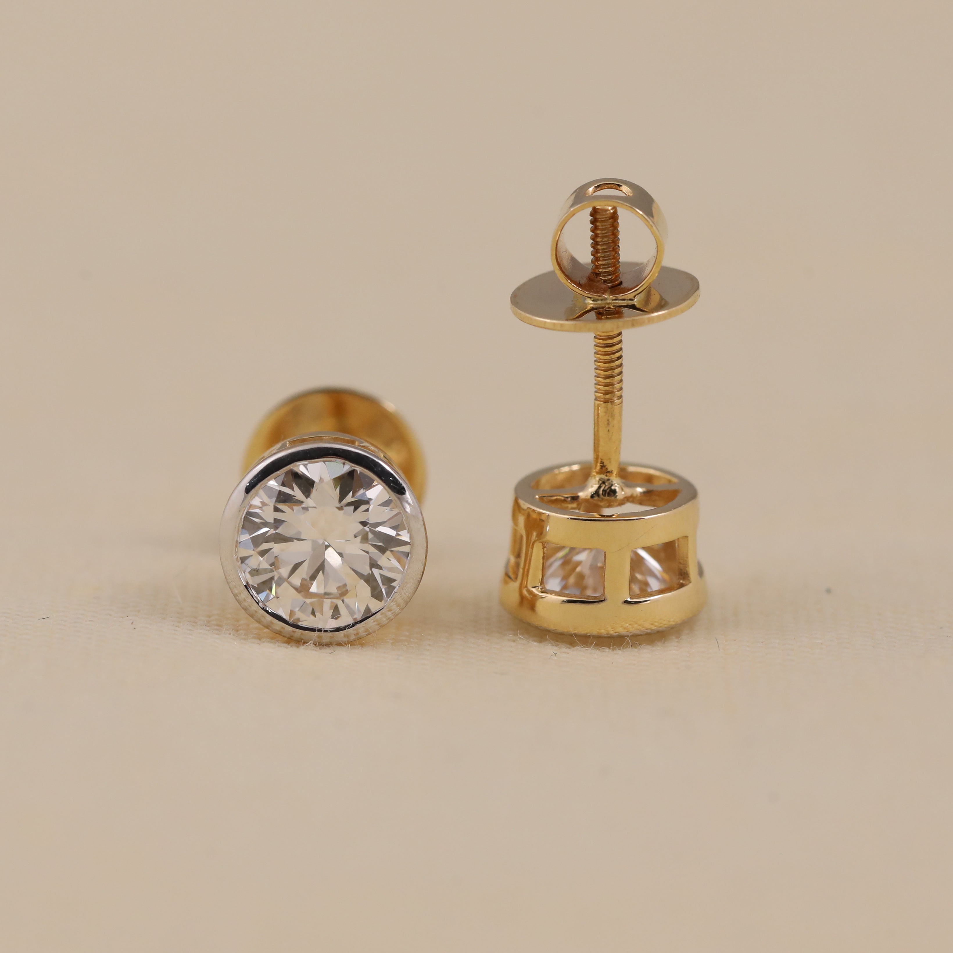 Classic round lab-grown diamond bezel studs for special celebration moments