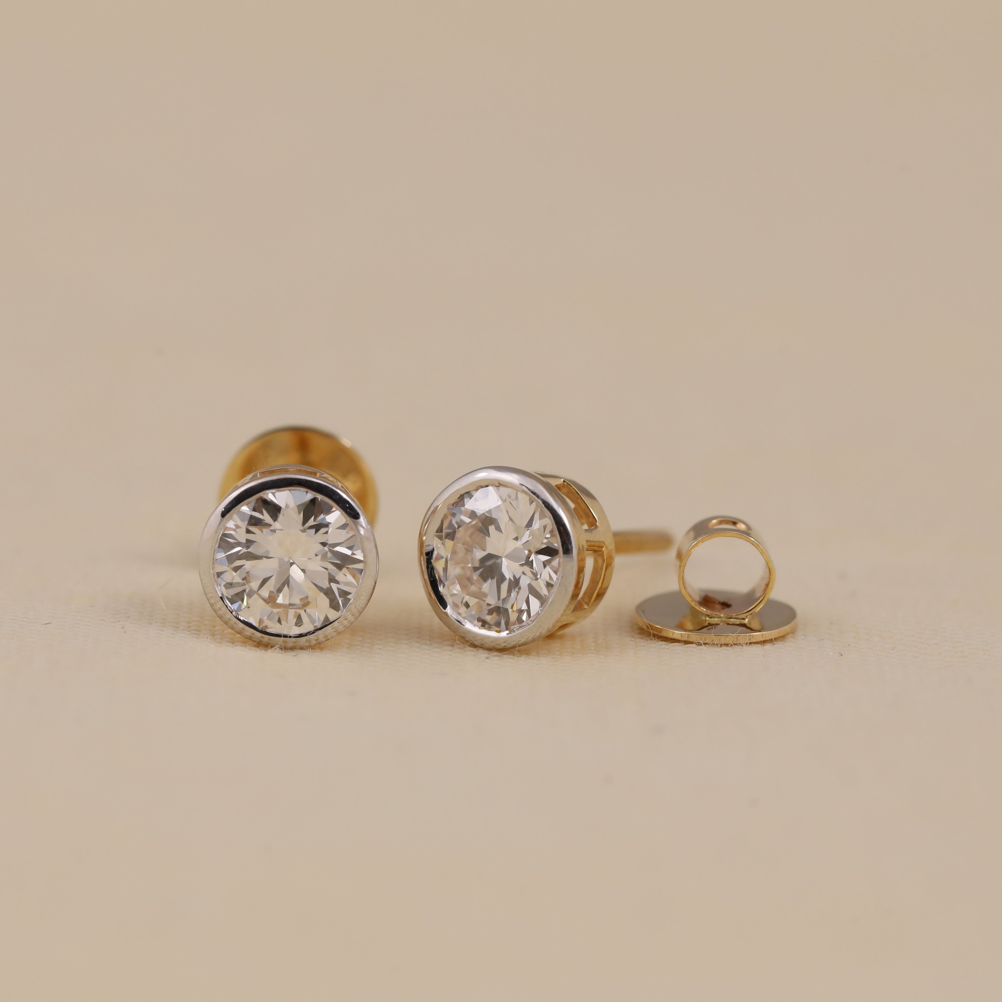 Simple round diamond stud earrings designed for everyday style occasions