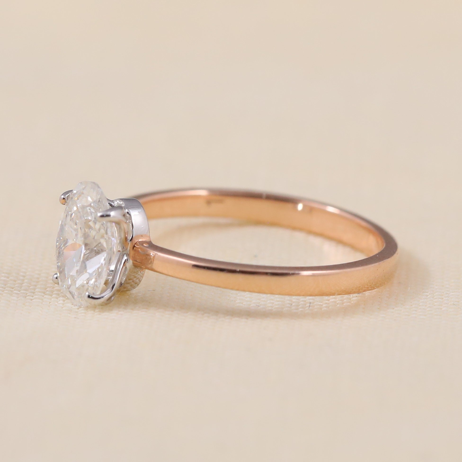 Elegant engagement ring showcasing a brilliant oval lab grown diamond centerpiece