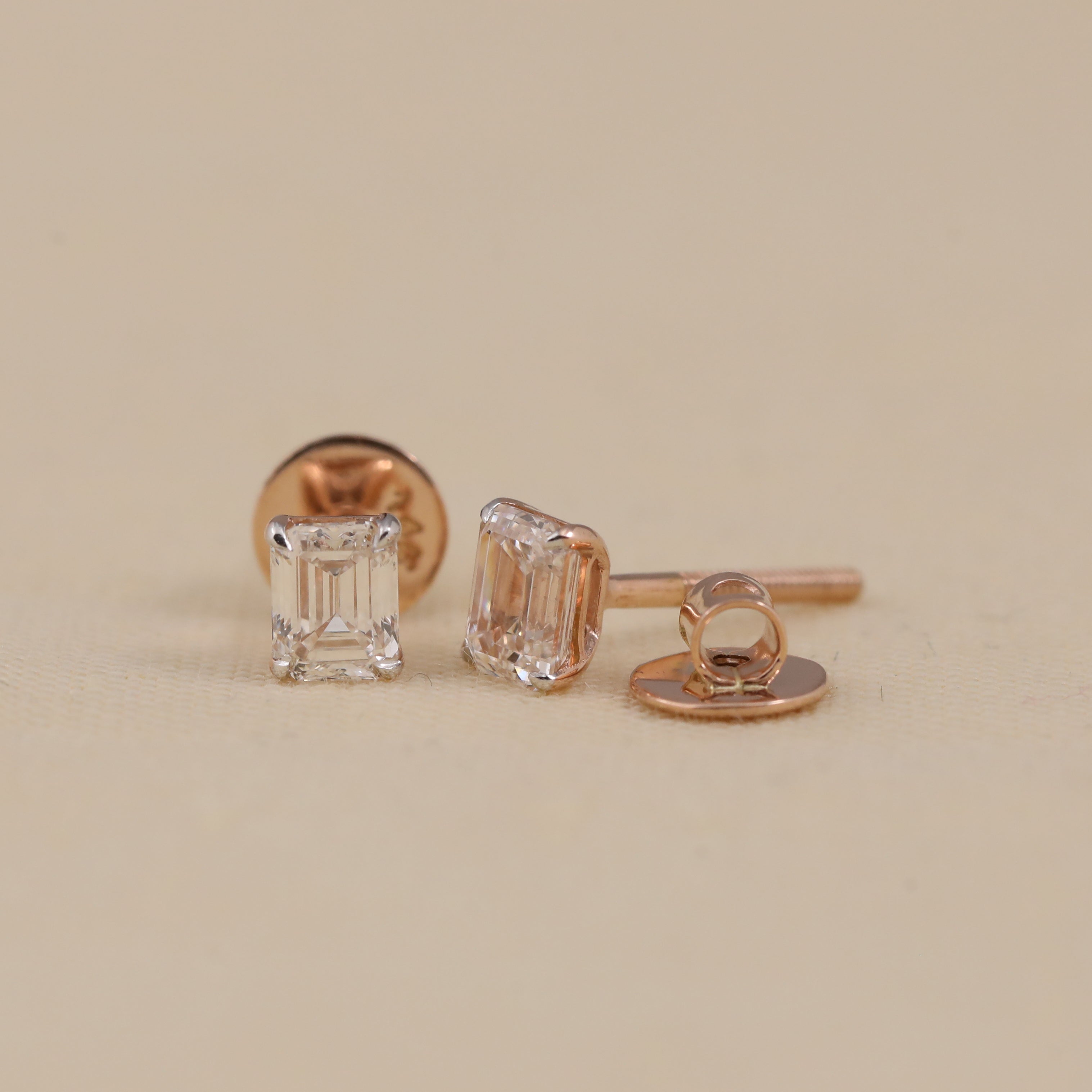 Classic emerald cut diamond earrings crafted for everyday wear or gifting.