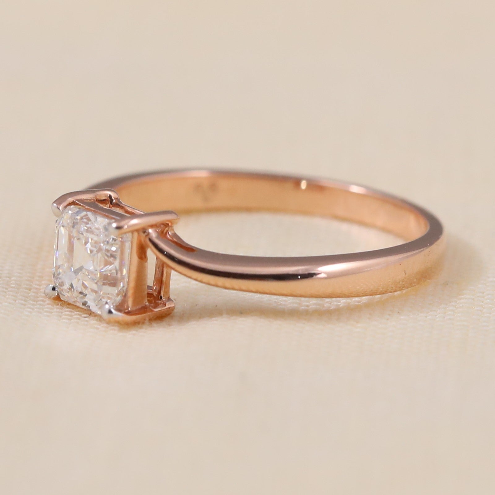 Minimalist solitaire ring featuring a stunning Asscher cut ethical lab grown diamond