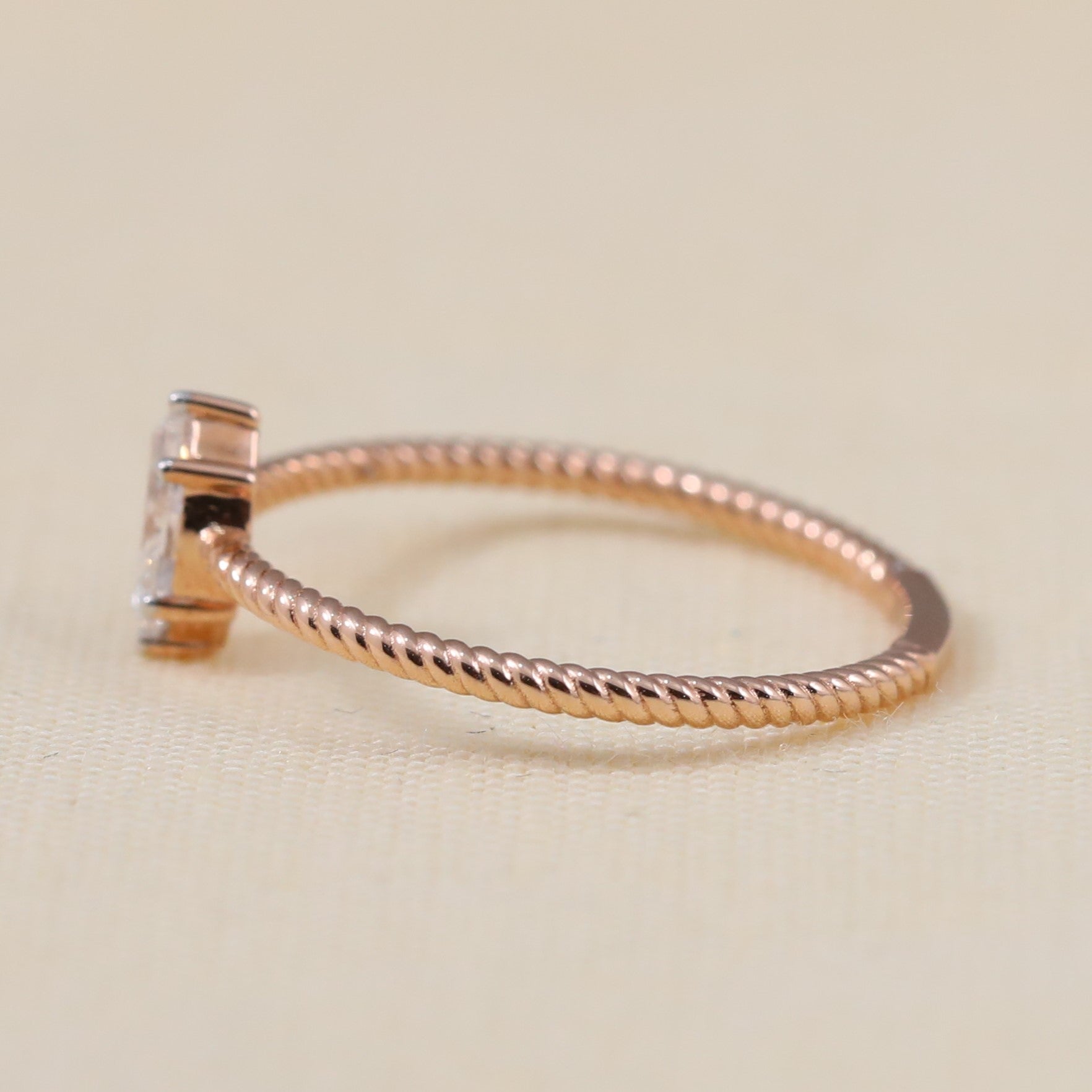 Twisted band marquise lab grown diamond promise ring with minimalist sparkle