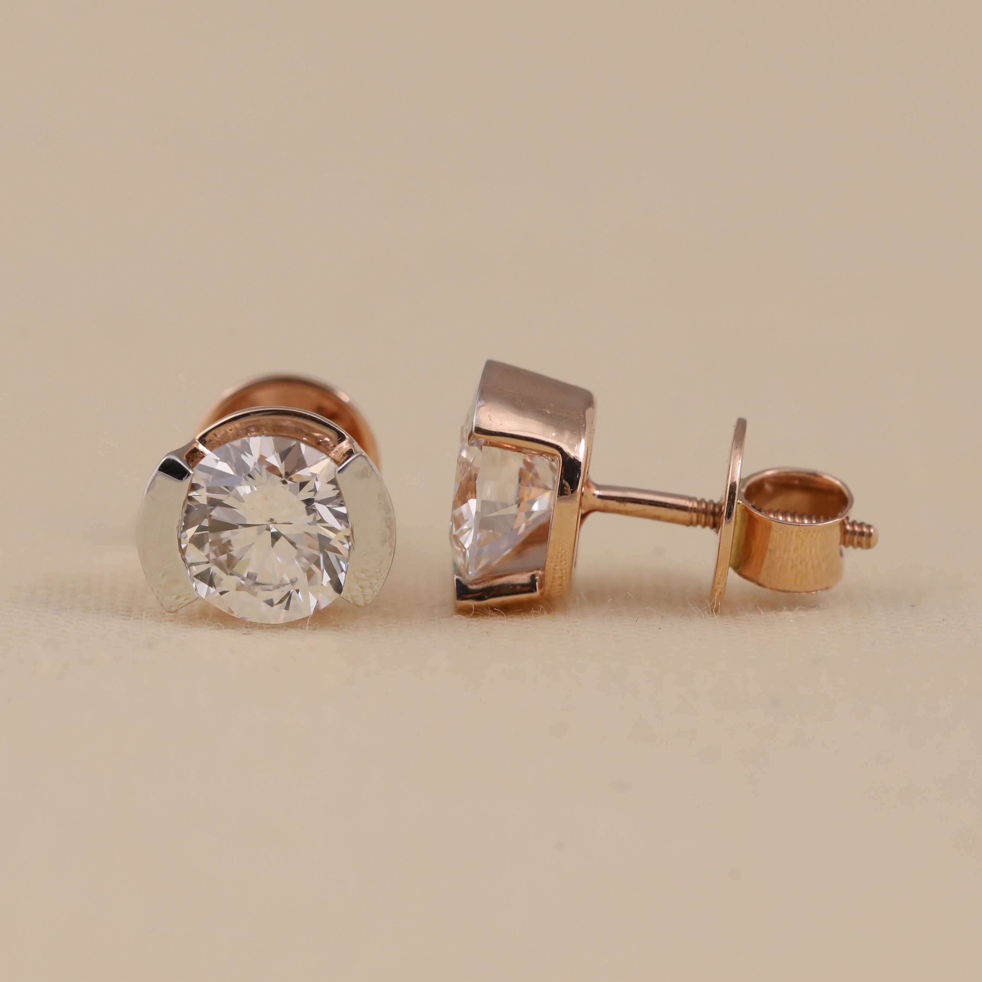 Contemporary round diamond stud earrings perfect for birthday gifting.