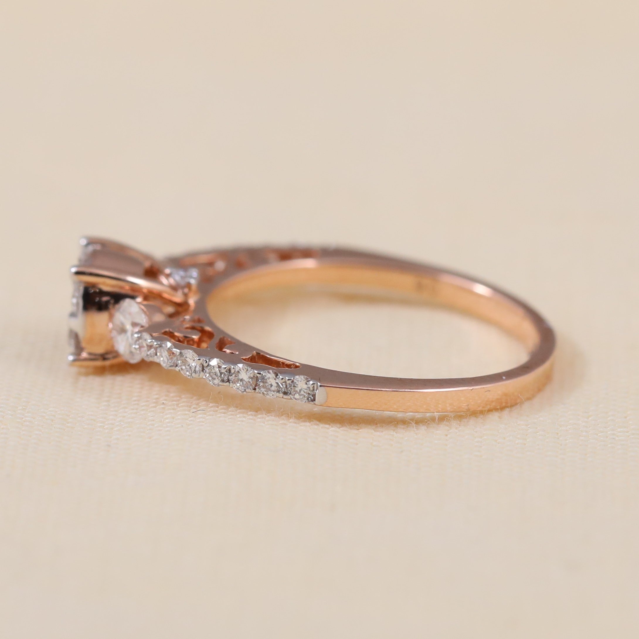 Delicate lab grown diamond cluster ring crafted with accent stones along band.