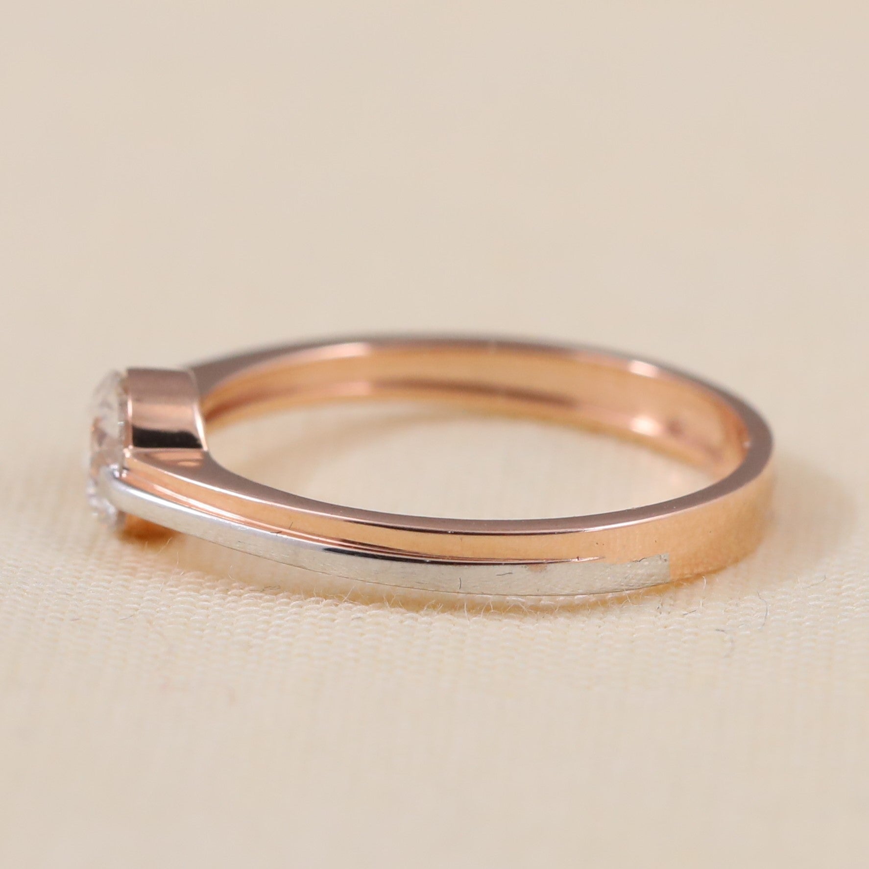 Modern bezel style lab grown diamond ring designed with a polished two tone band