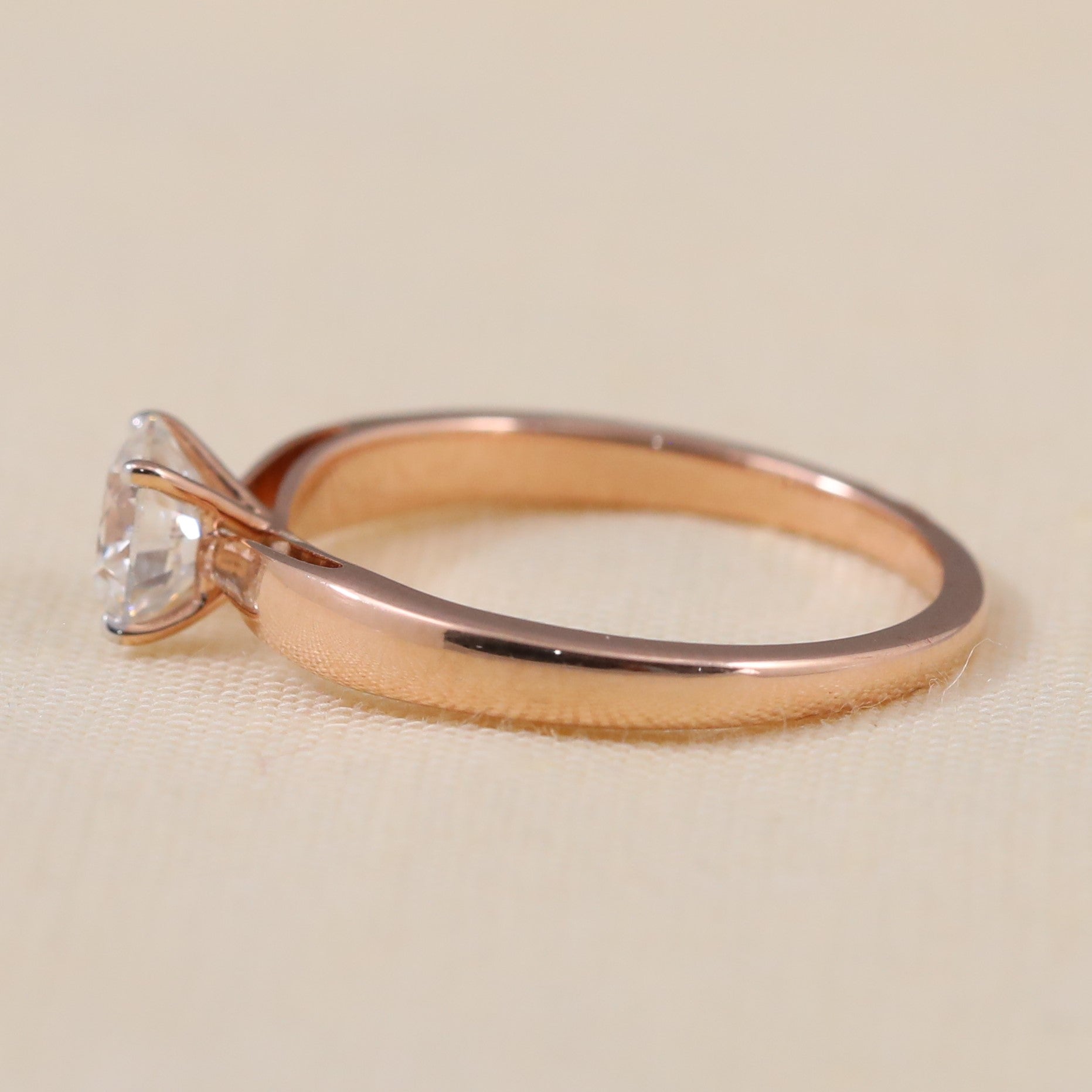 Classic round lab-grown diamond ring designed with a sleek polished band
