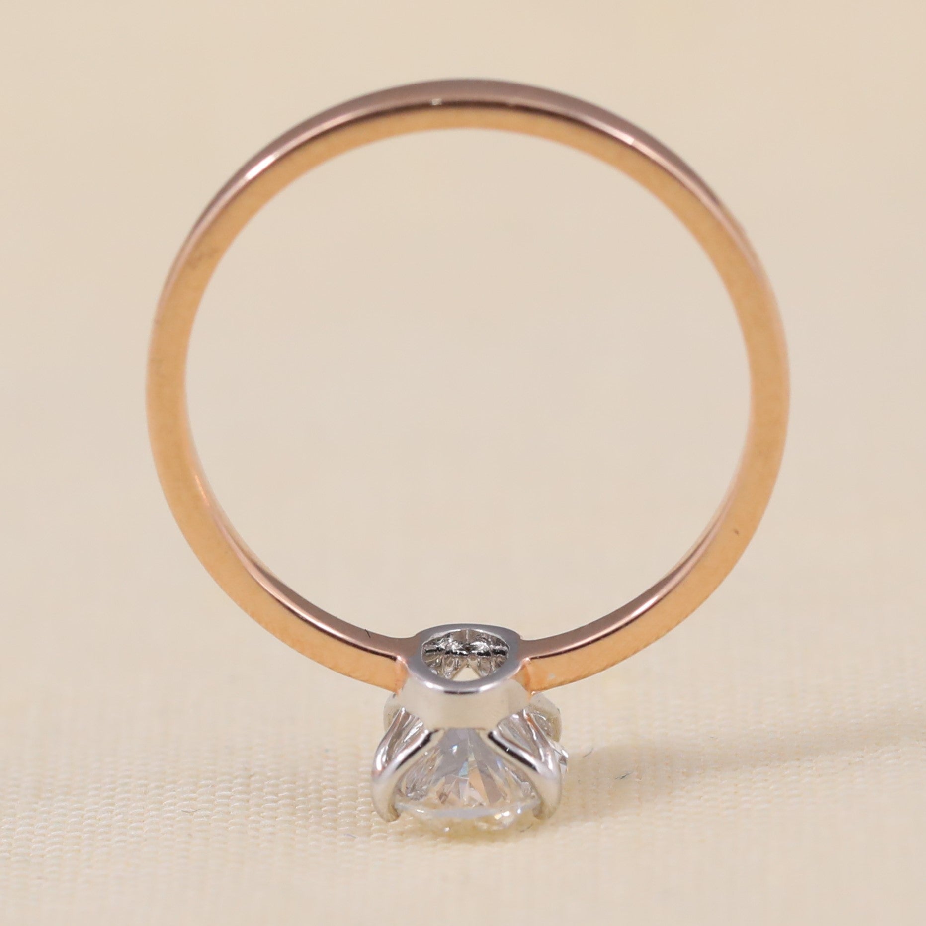 Minimalist solitaire ring highlighting a radiant oval ethical lab grown diamond
