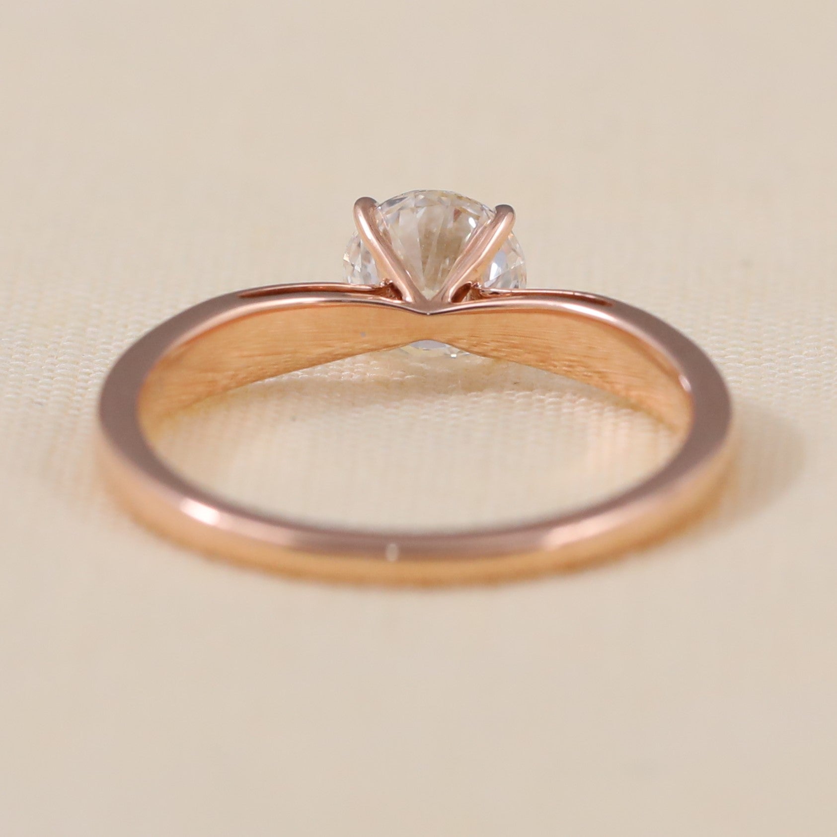 Beautiful round solitaire ring featuring a bright ethical lab-grown diamond