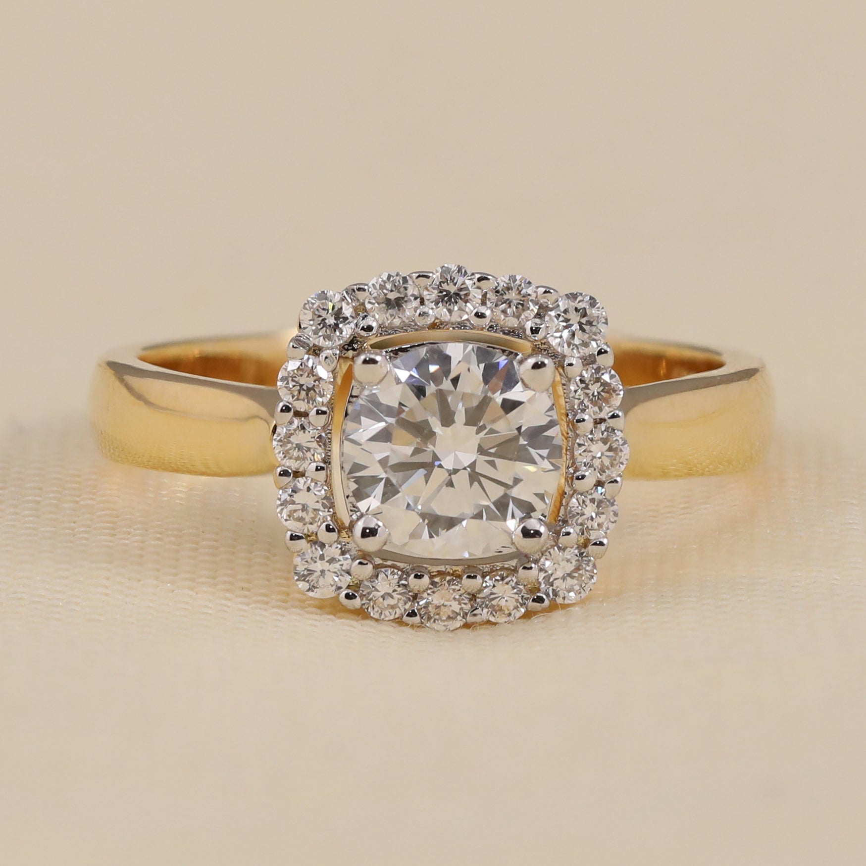 Halo lab diamond engagement ring with a brilliant round center stone