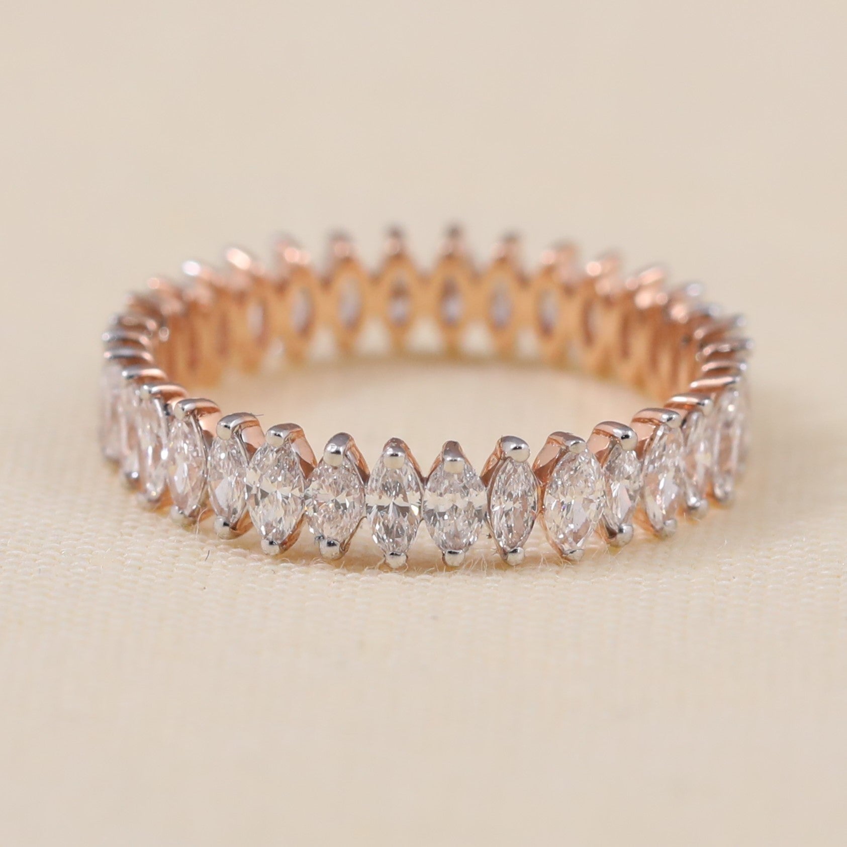 Marquise lab grown diamond eternity band featuring a full circle of sparkle
