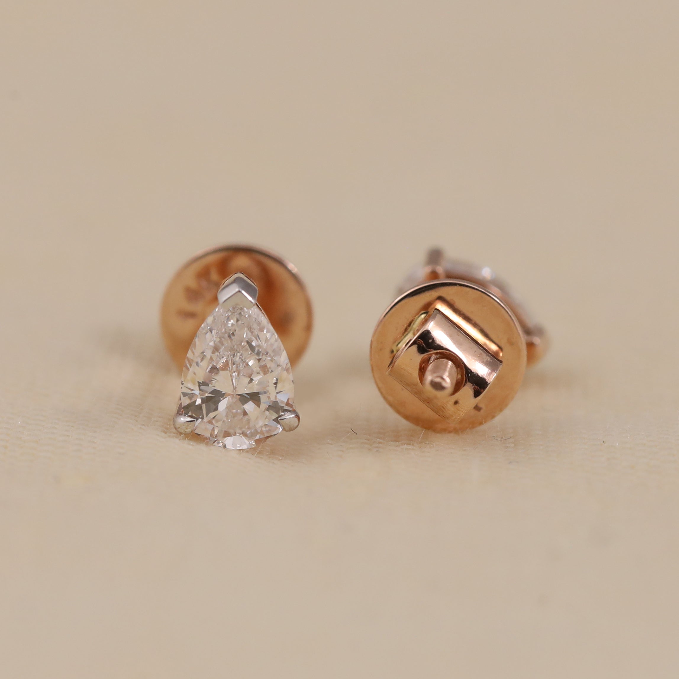 Elegant pear diamond studs ideal for birthday or anniversary celebrations.