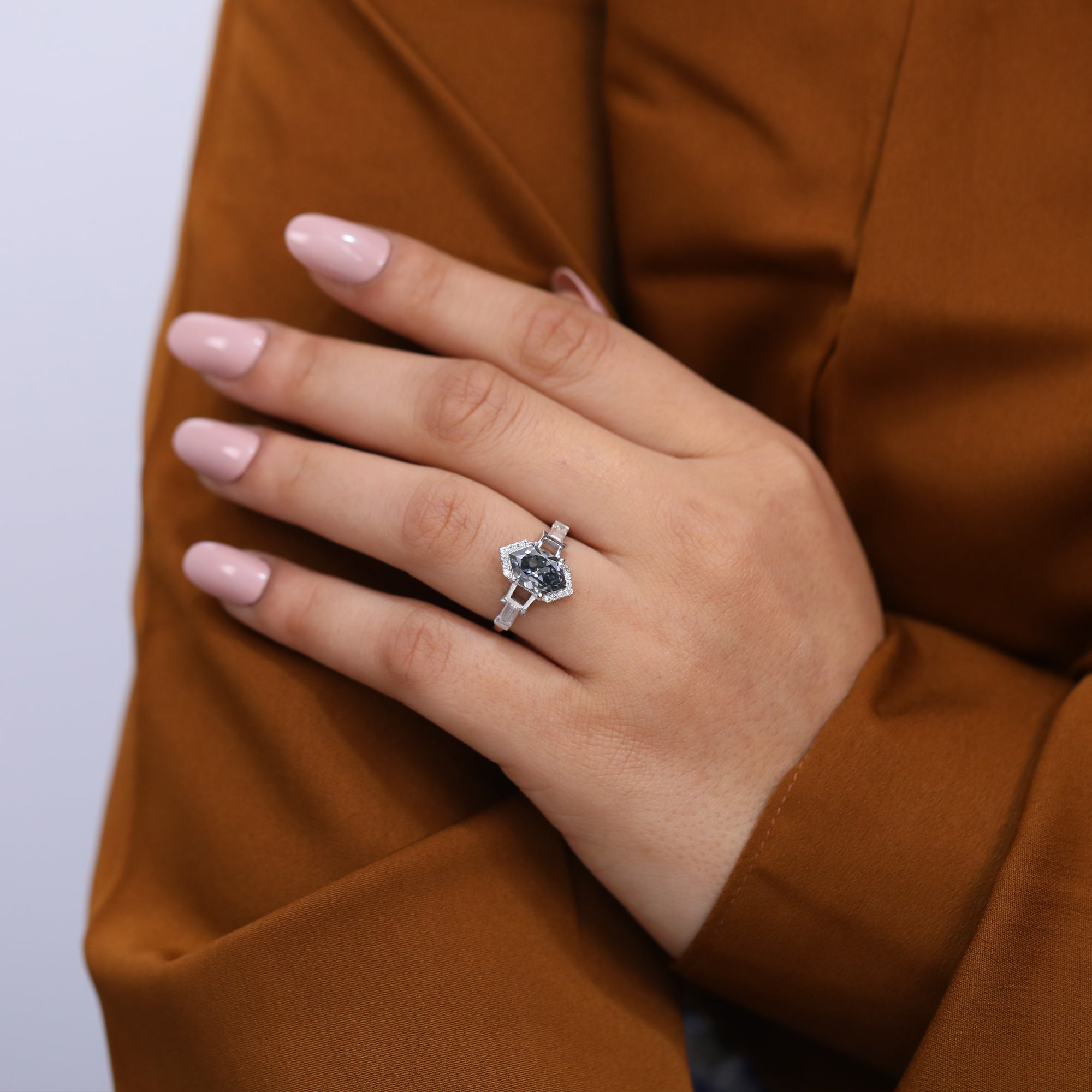 Art-deco inspired hexagon diamond ring with baguette cuts