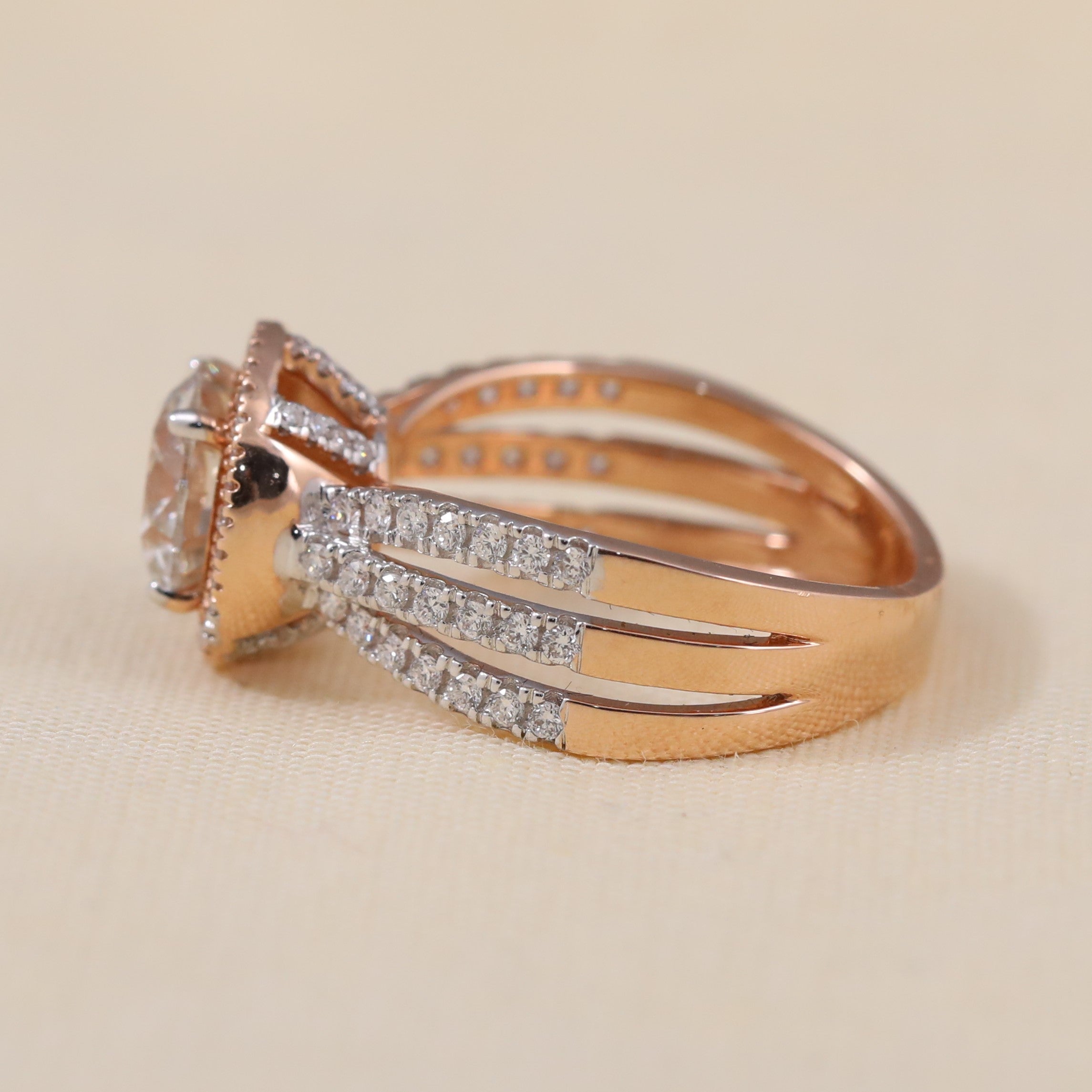 Triple band halo ring showcasing a brilliant round lab grown diamond center