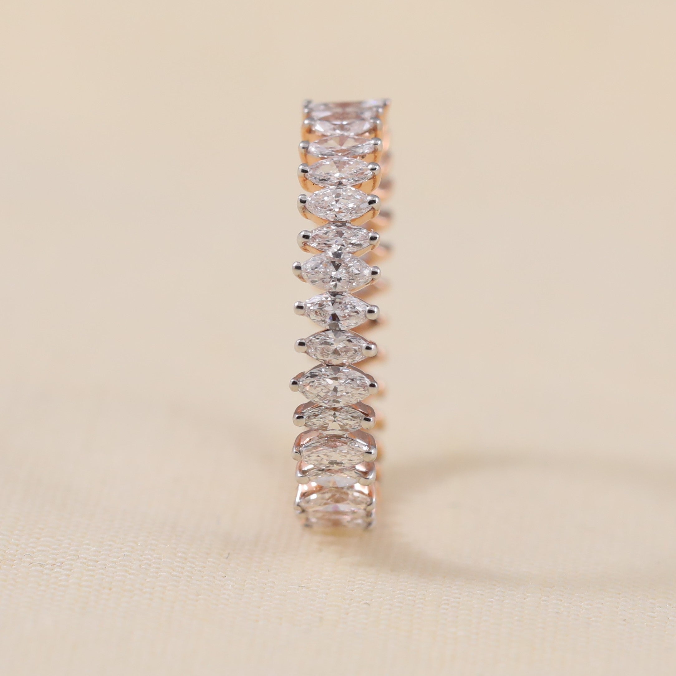 Continuous band featuring shimmering marquise ethical lab-grown diamonds