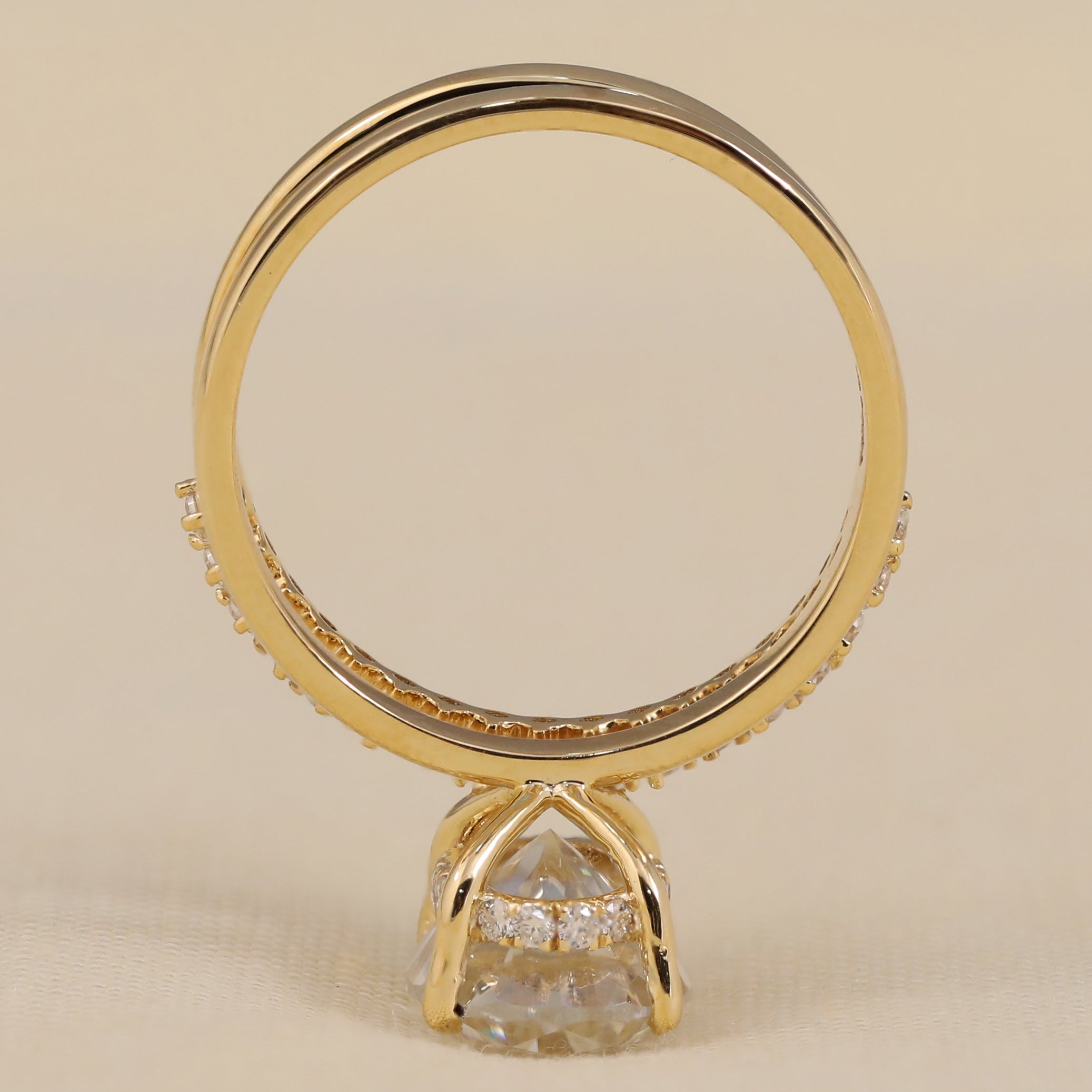 Oval lab diamond ring set featuring a brilliant center stone and pavé accent band