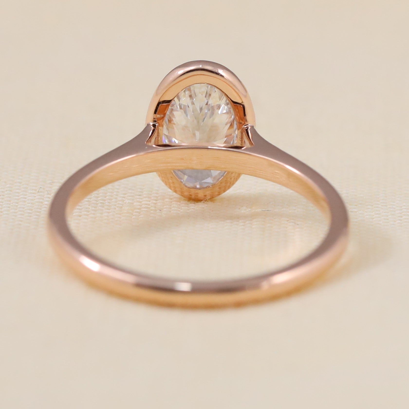 Modern bezel set oval lab grown diamond ring perfect for meaningful celebrations.