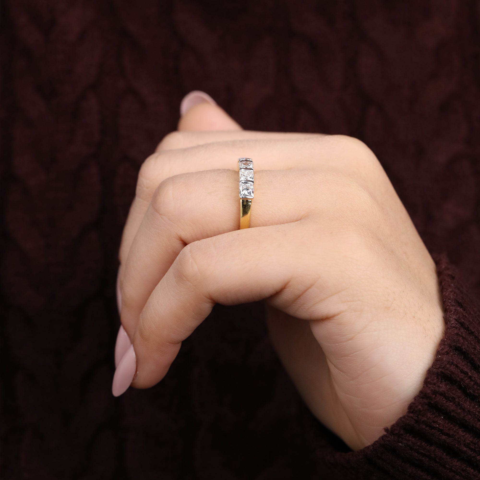 Lab-grown princess-cut diamond ring with a sleek row of sparkling stones