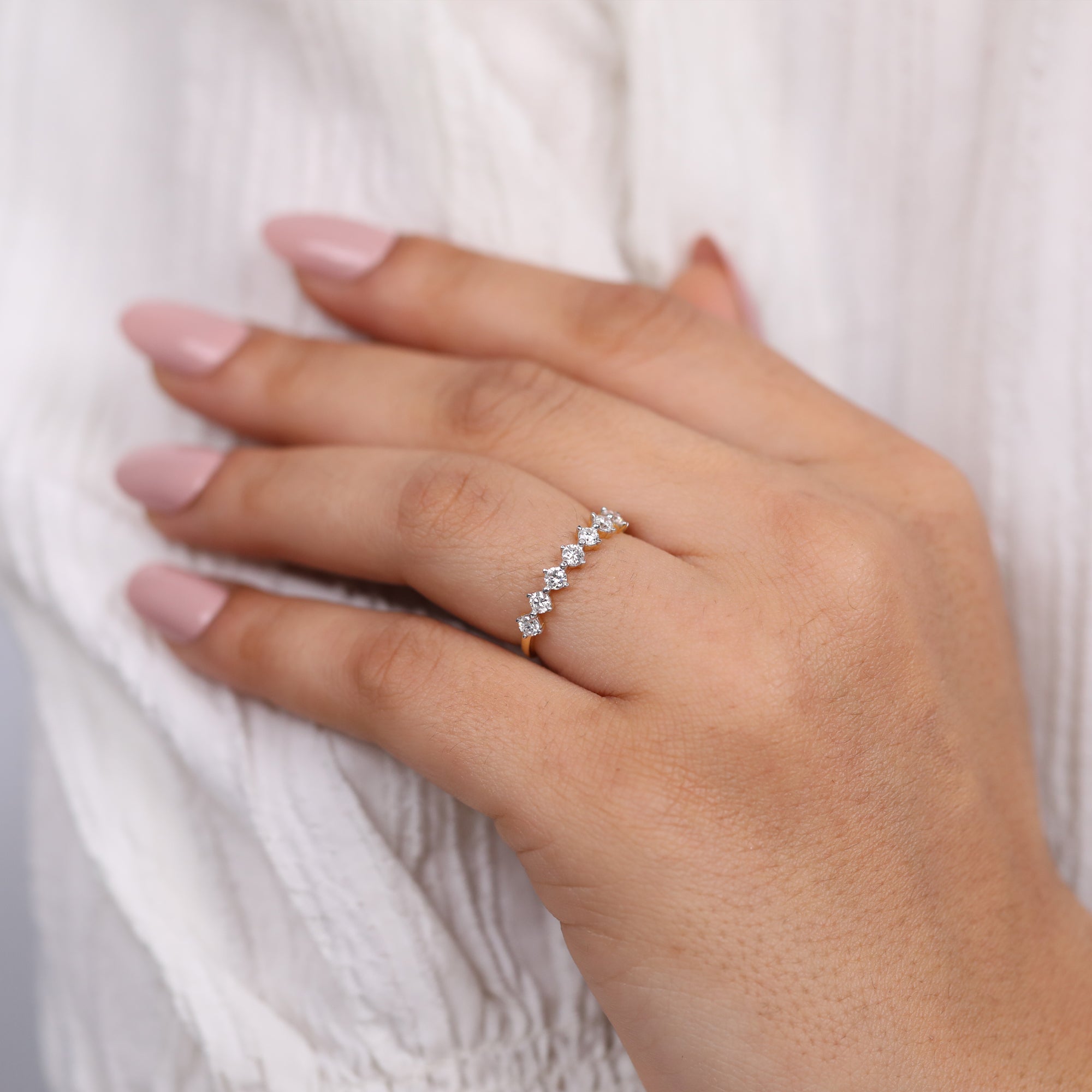 Fine jewelry diamond eternity band with round brilliant diamonds