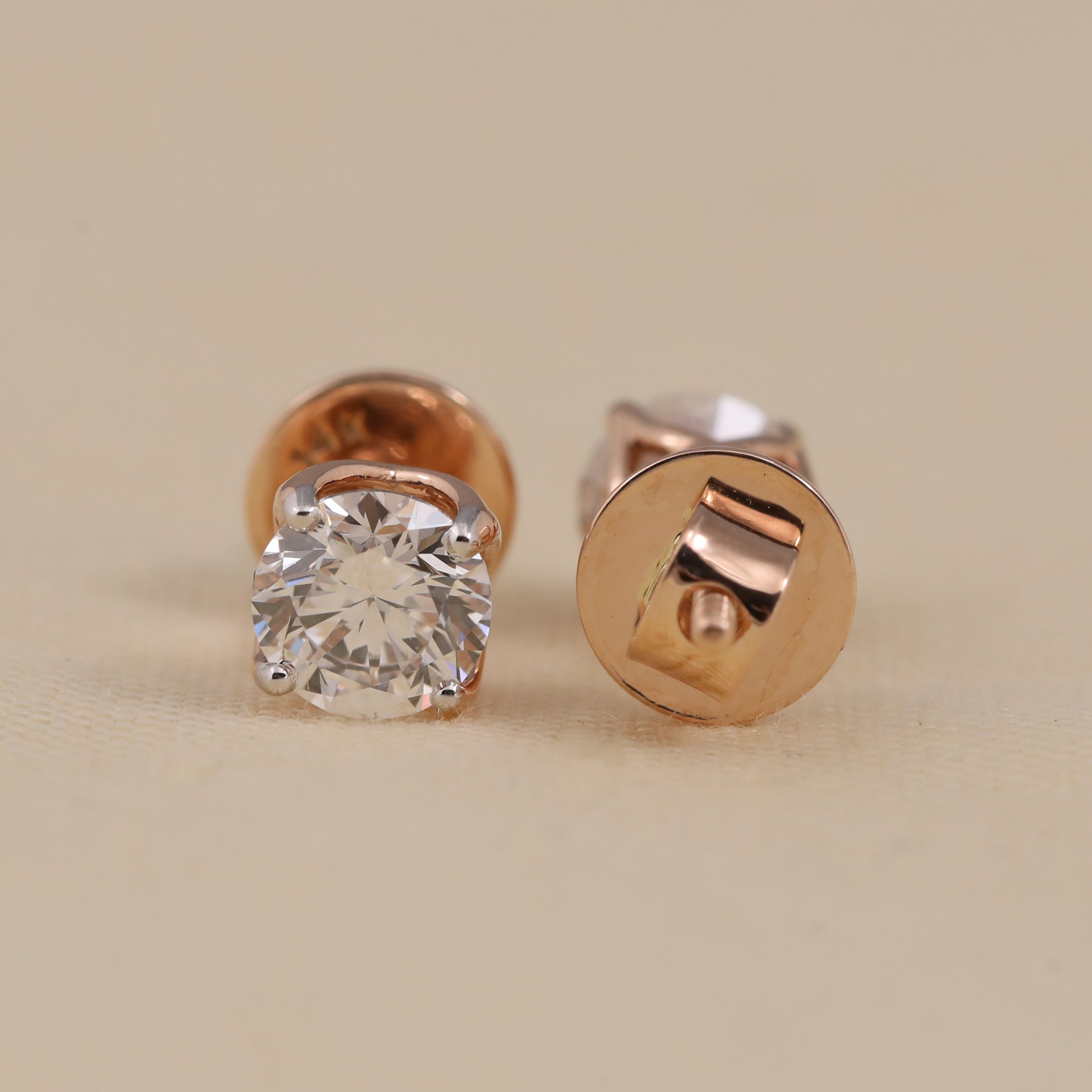 Classic round diamond stud earrings perfect for anniversary gifts or everyday elegance