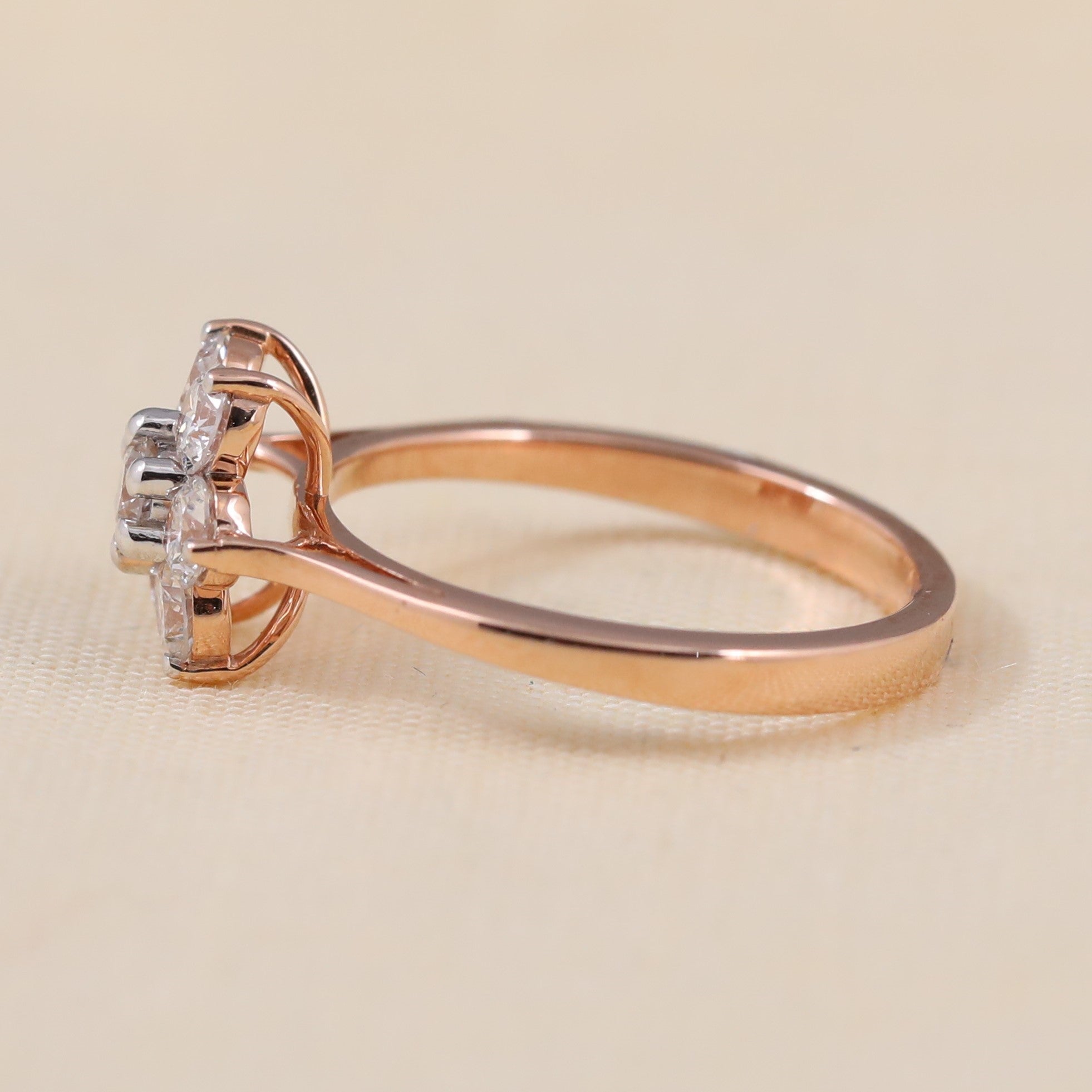 Delicate flower design ring featuring a cluster of lab grown diamonds