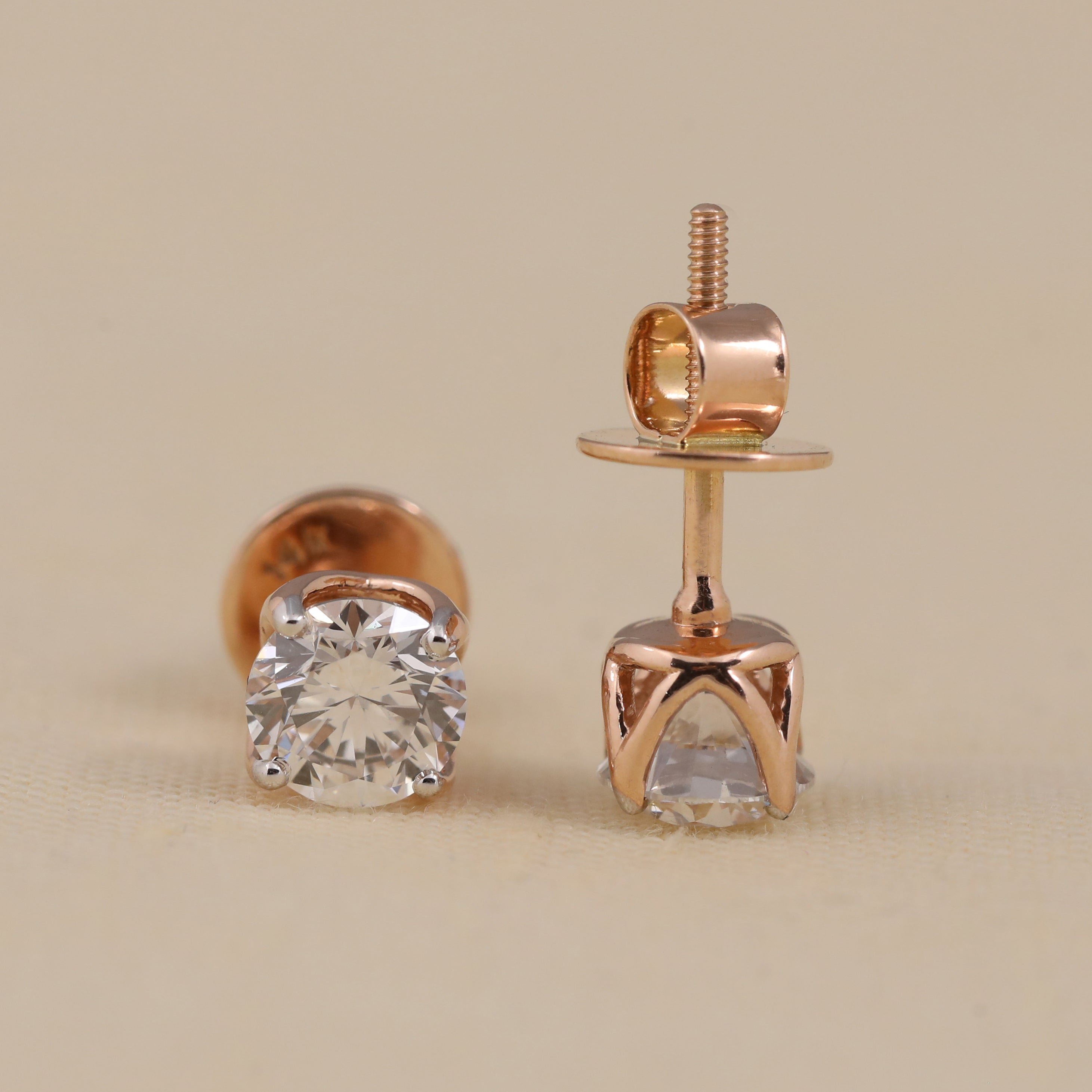 Sparkling round solitaire diamond studs designed for birthdays and special celebrations
