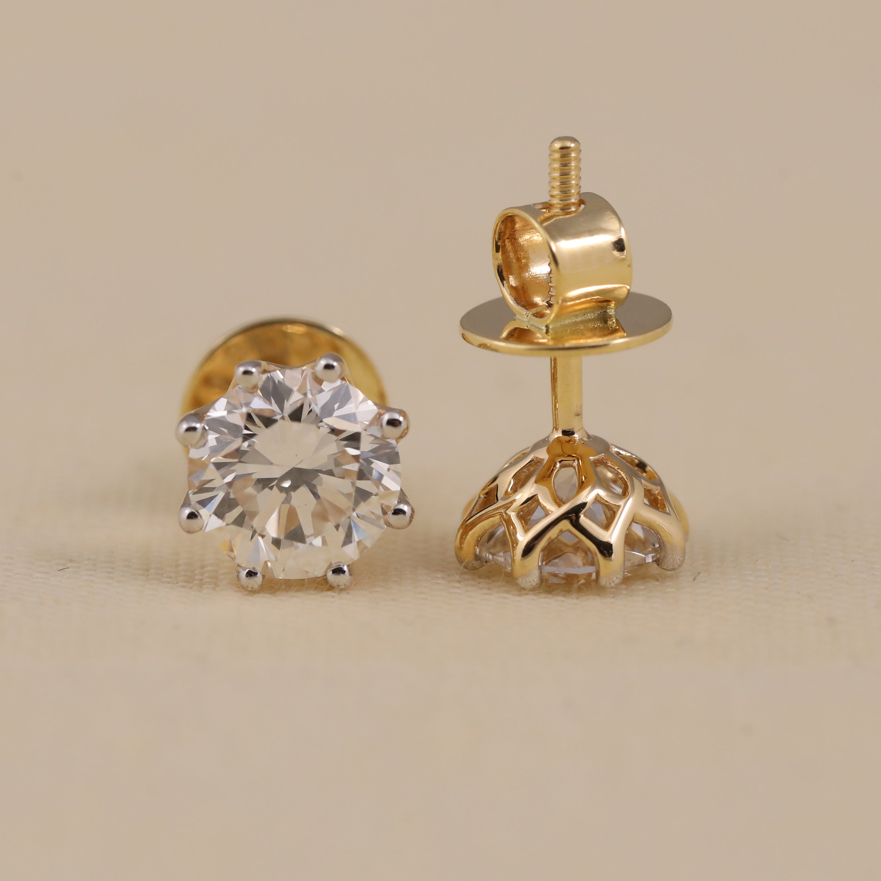 Classic round diamond earrings suited for birthday and wedding celebrations.