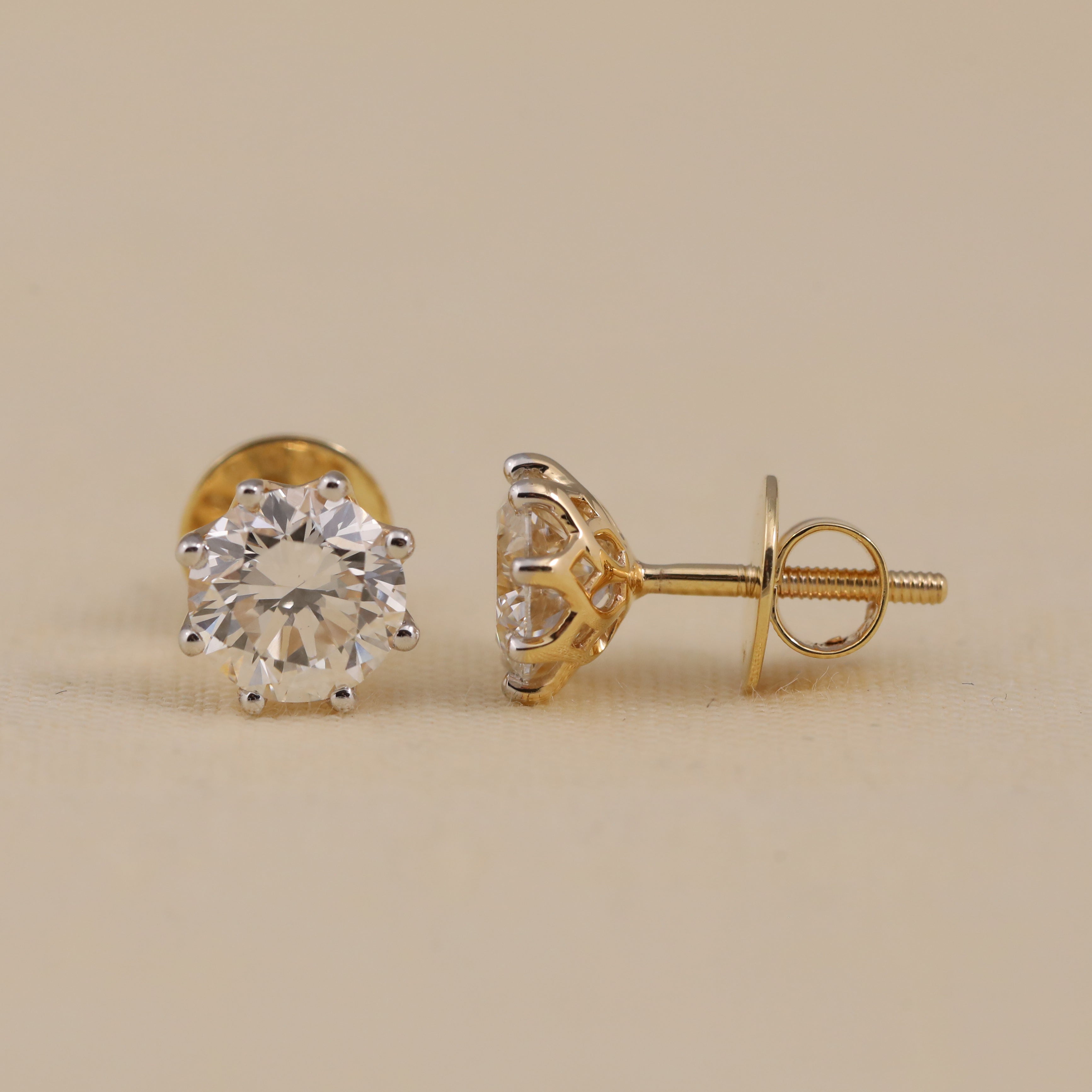 Brilliant solitaire diamond studs perfect for engagement or party wear.