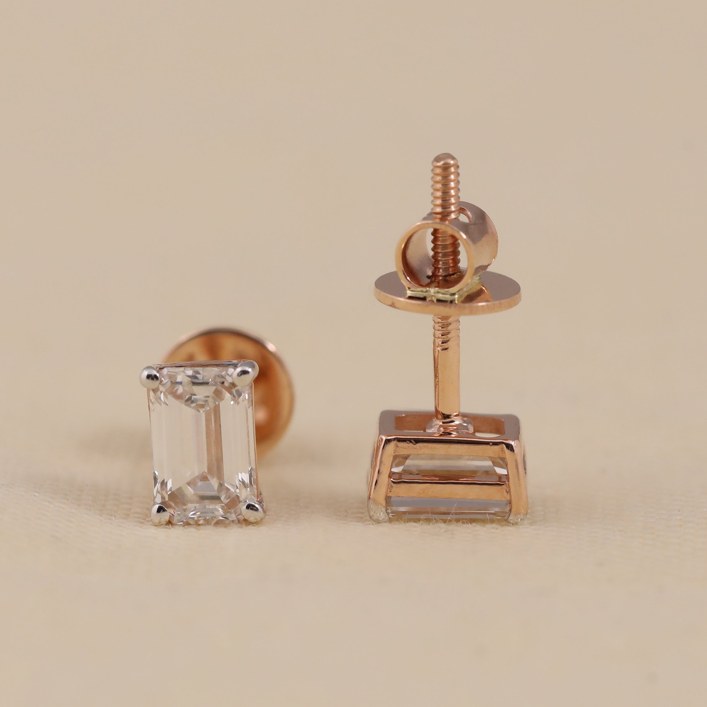 Minimal emerald-cut diamond earrings suited for daily wear and celebrations.