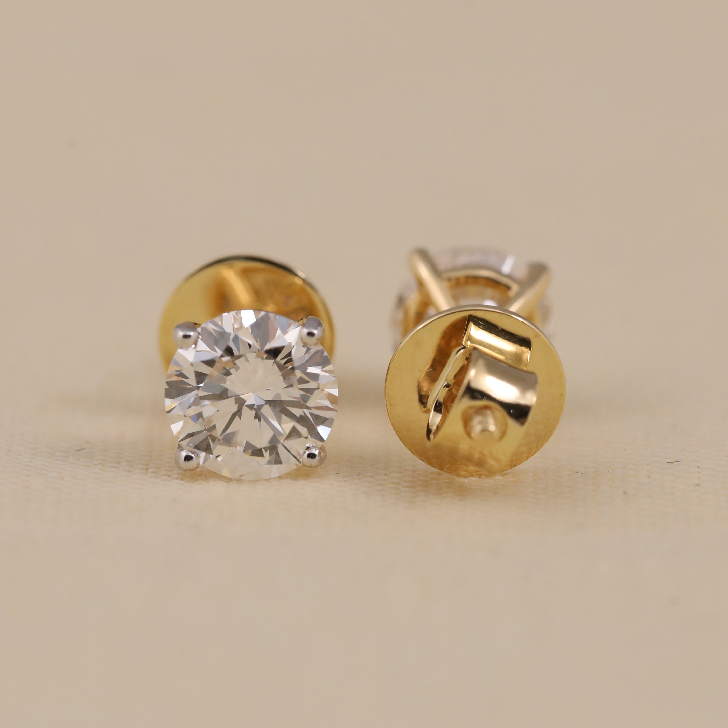 Elegant solitaire diamond studs ideal for anniversary celebrations.