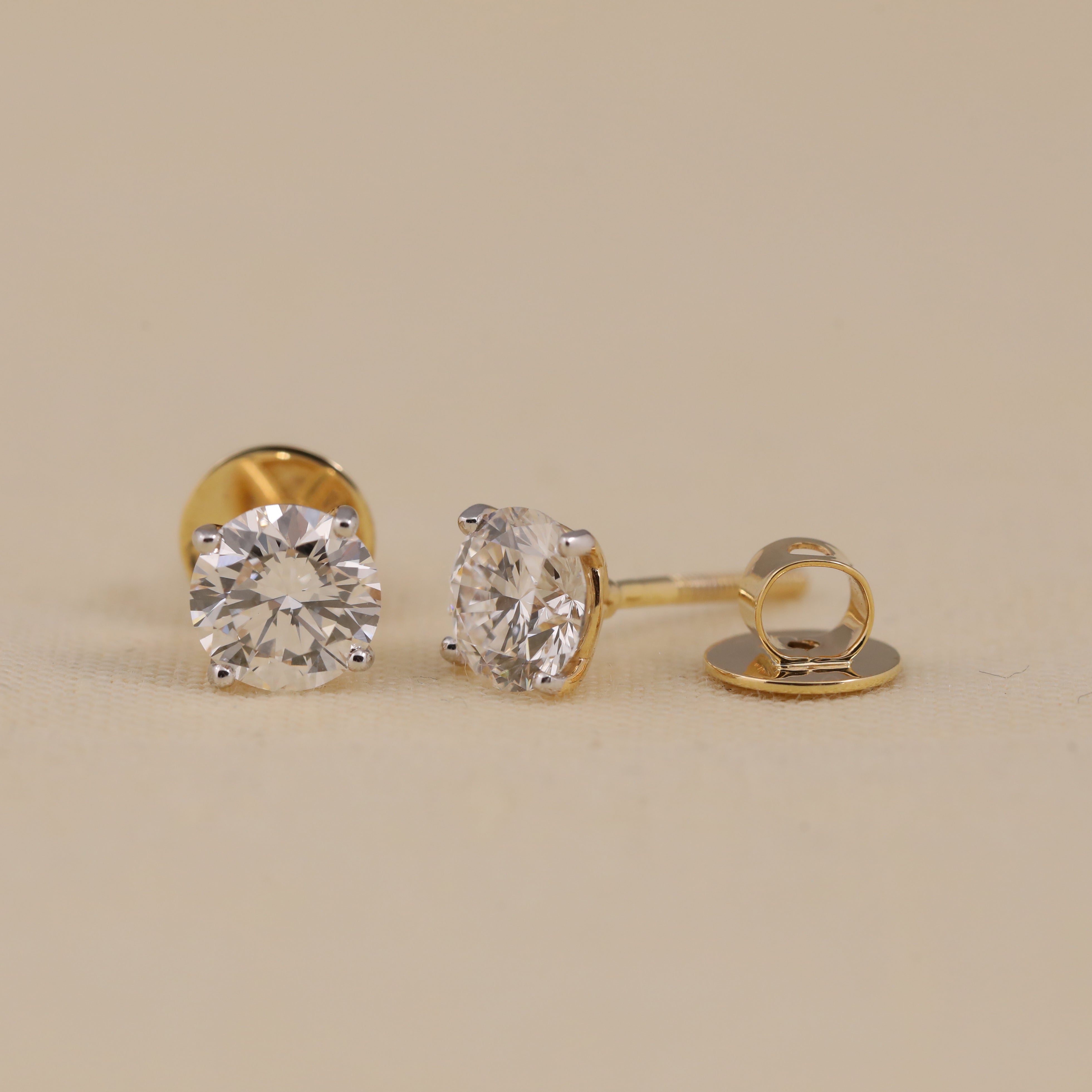 Timeless round diamond earrings ideal for birthday gifting.