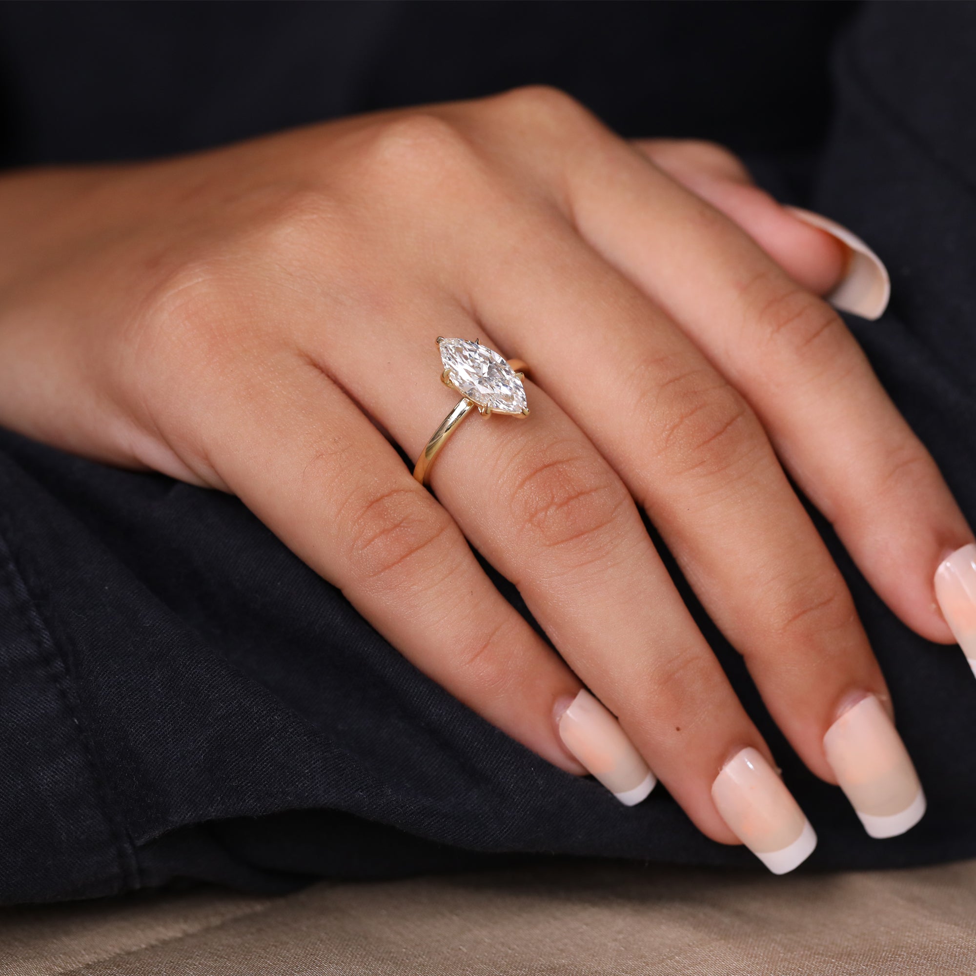 Timeless marquise-cut solitaire ring crafted in yellow gold