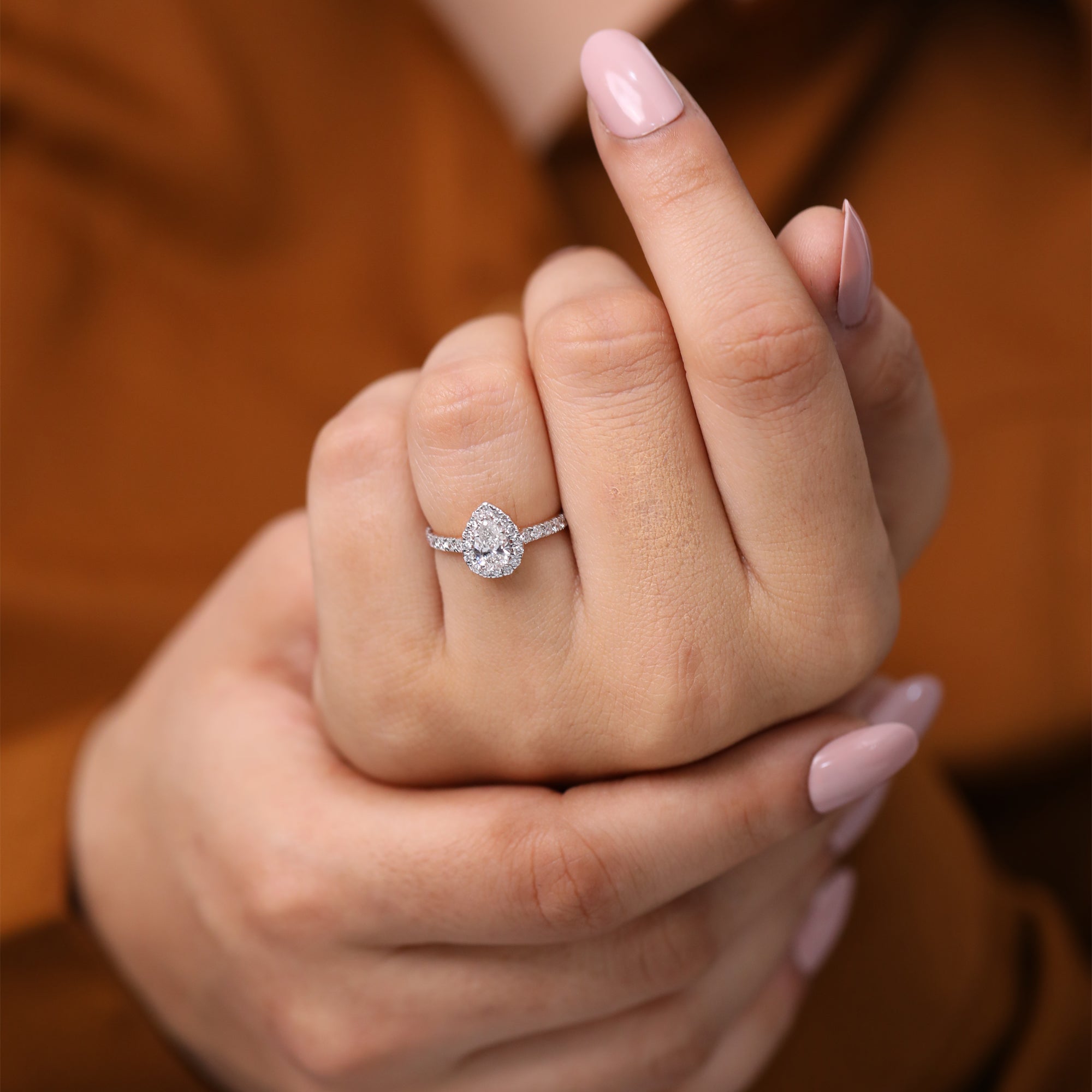 Luxury pear lab grown diamond halo ring with pavé diamond band