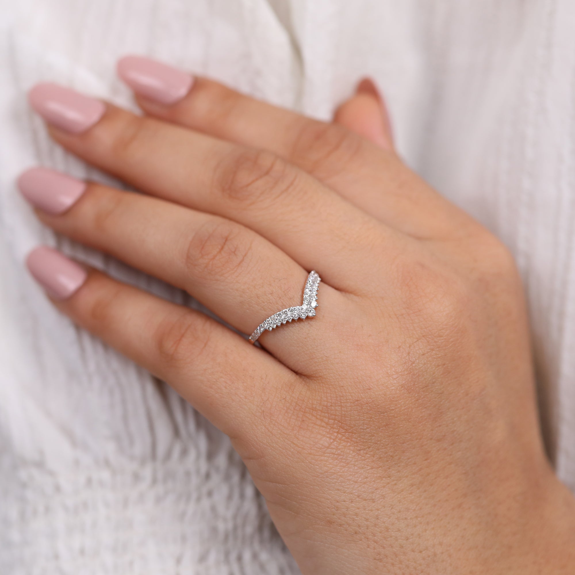 Chevron style lab grown diamond ring in rose gold with pavé accents