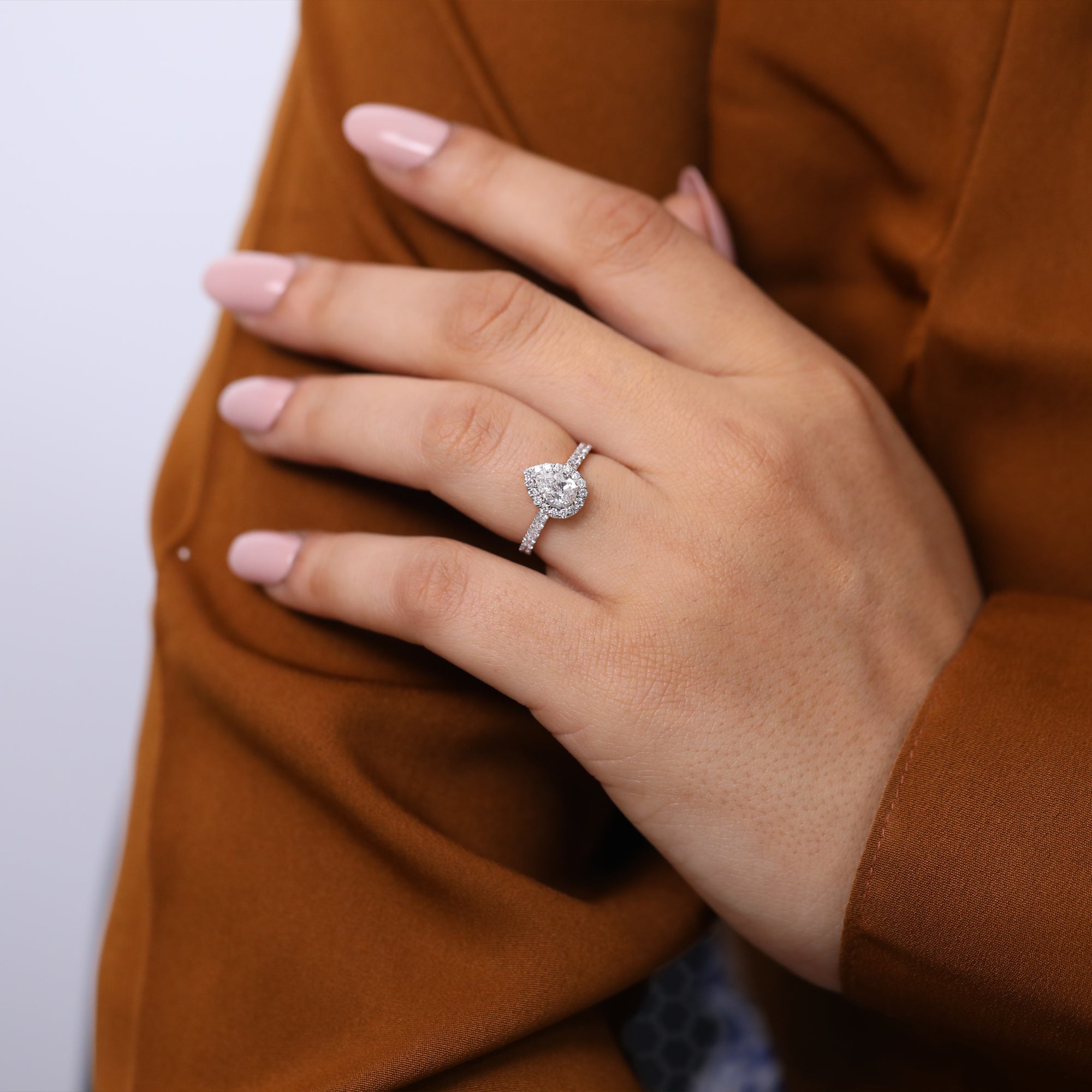 Luxury pear lab grown diamond halo ring with pavé diamond band