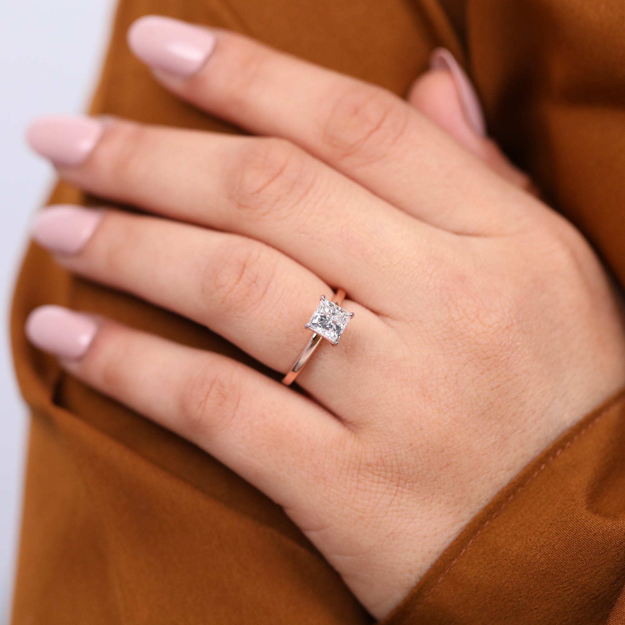 Timeless solitaire ring featuring a sparkling princess cut lab grown diamond