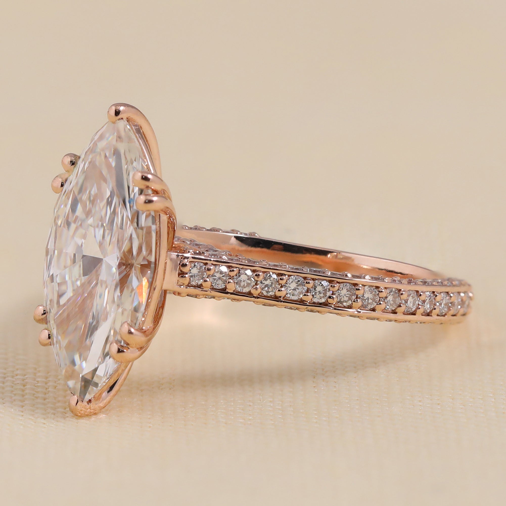 Luxury rose gold marquise lab grown diamond ring with slim pavé band