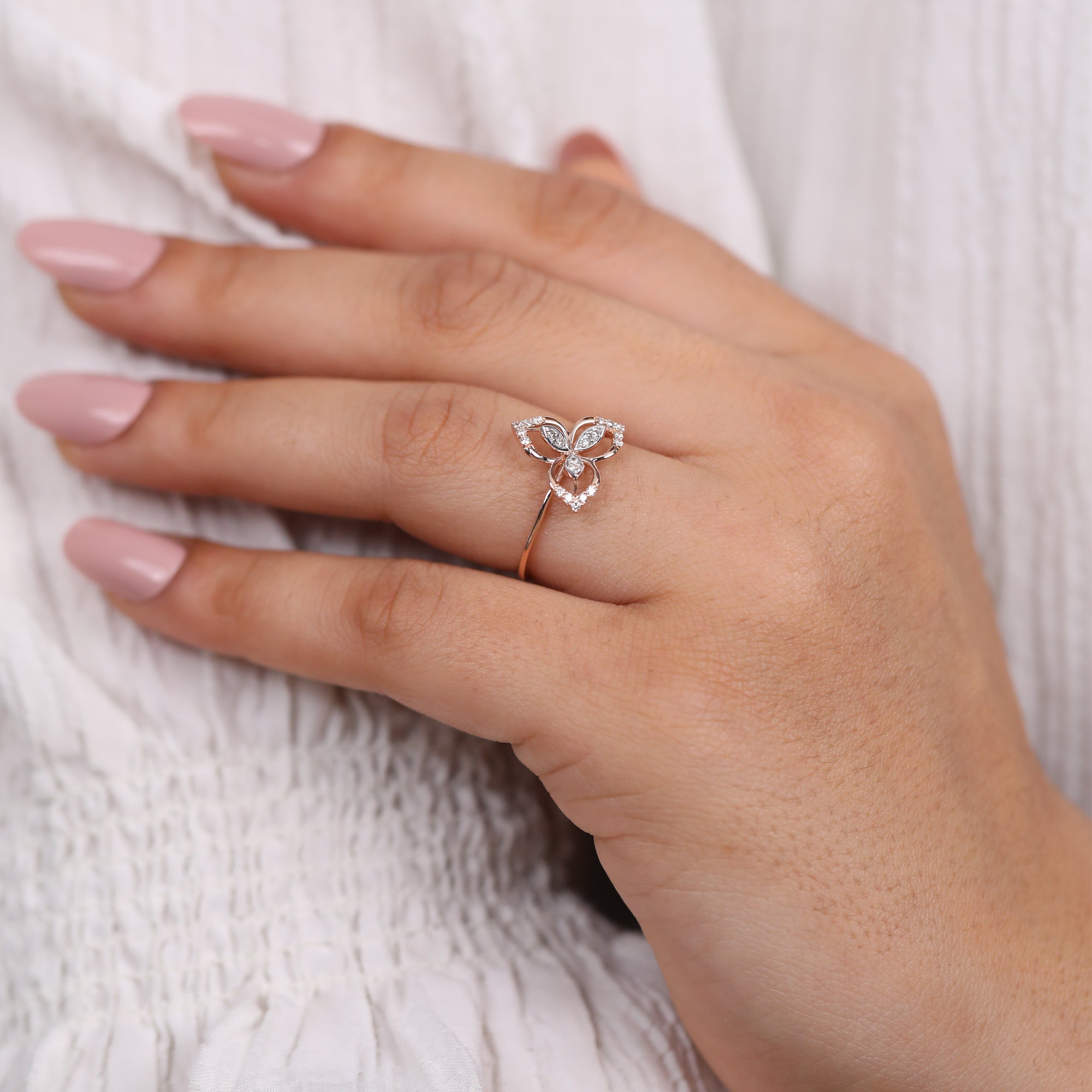 Vintage style rose gold ring with floral lab grown diamond arrangement