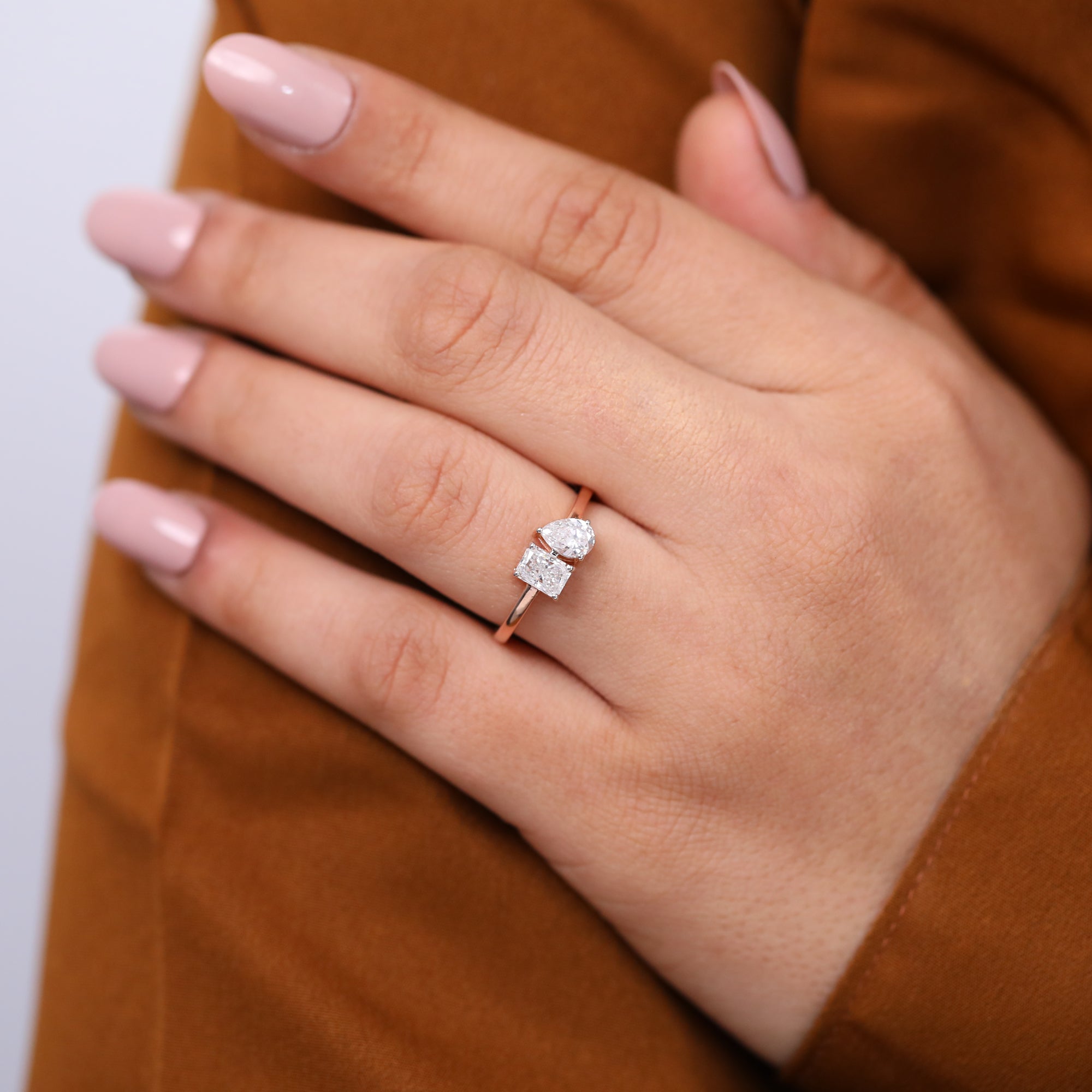 Elegant toi et moi ring showcasing radiant and pear lab grown diamonds