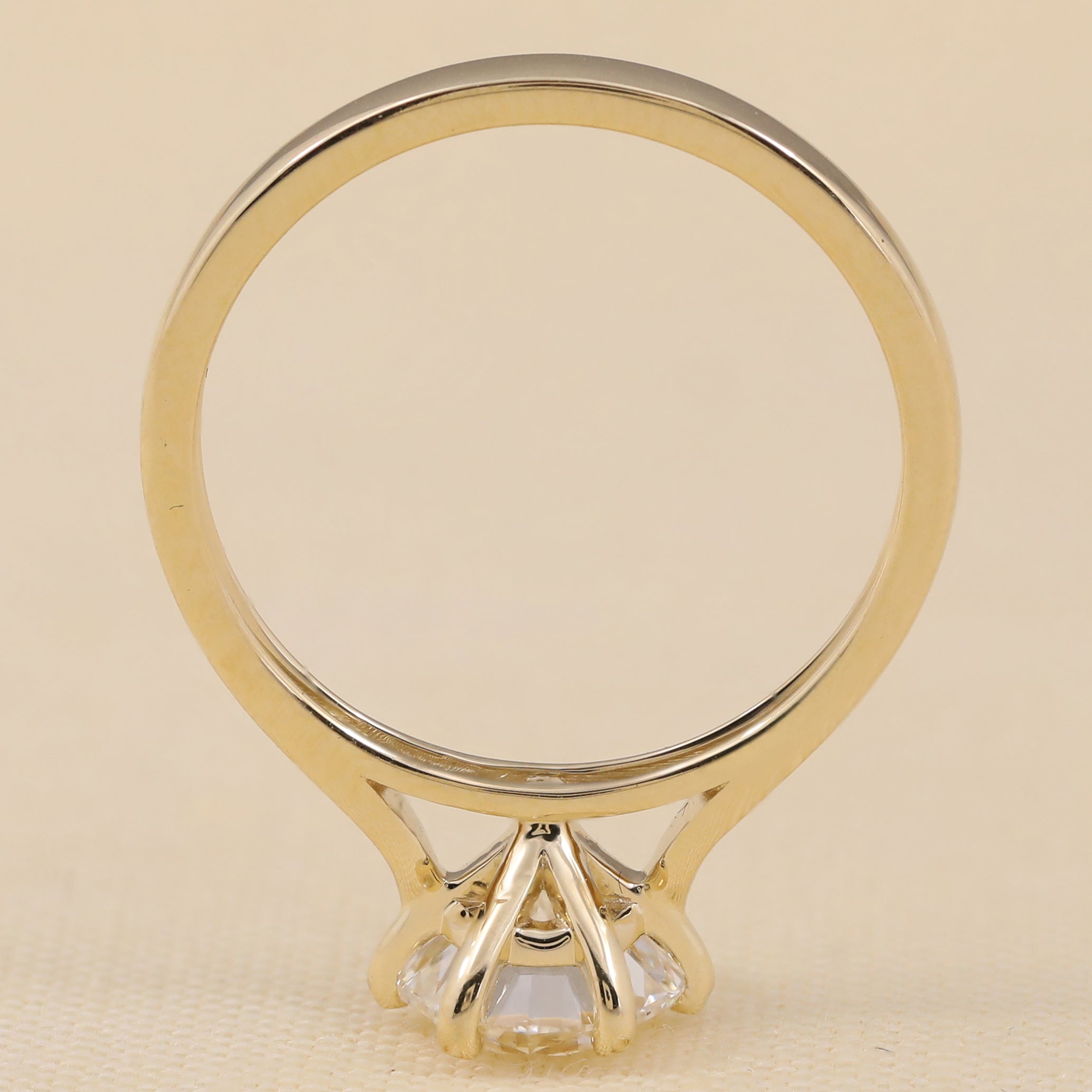 Minimalist solitaire ring showcasing a round cut lab grown diamond